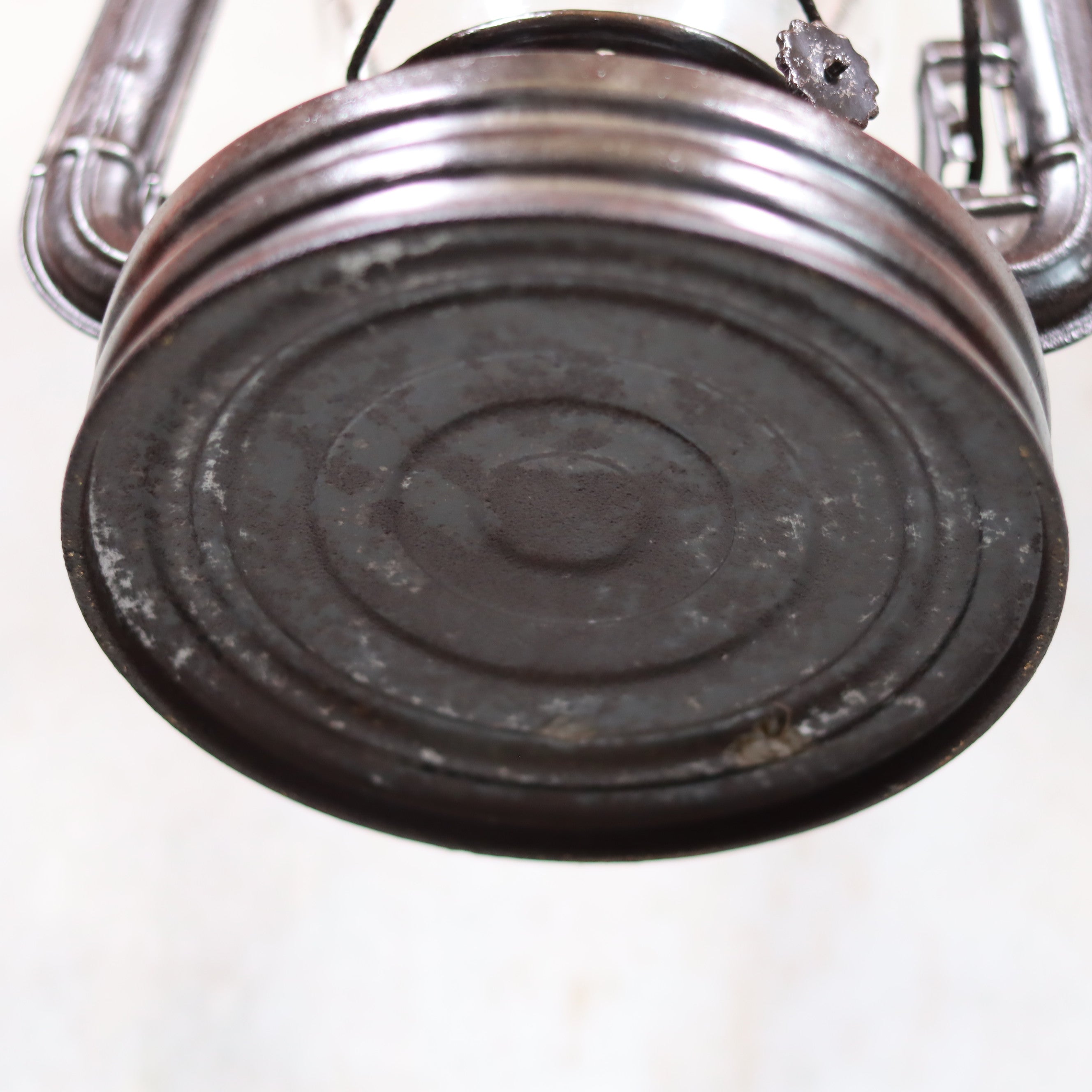 Vintage French ALG No. 6 Hurricane Lantern – Cristal Supérieur Glass (1930s) showing the base and metal details of the oil lamp