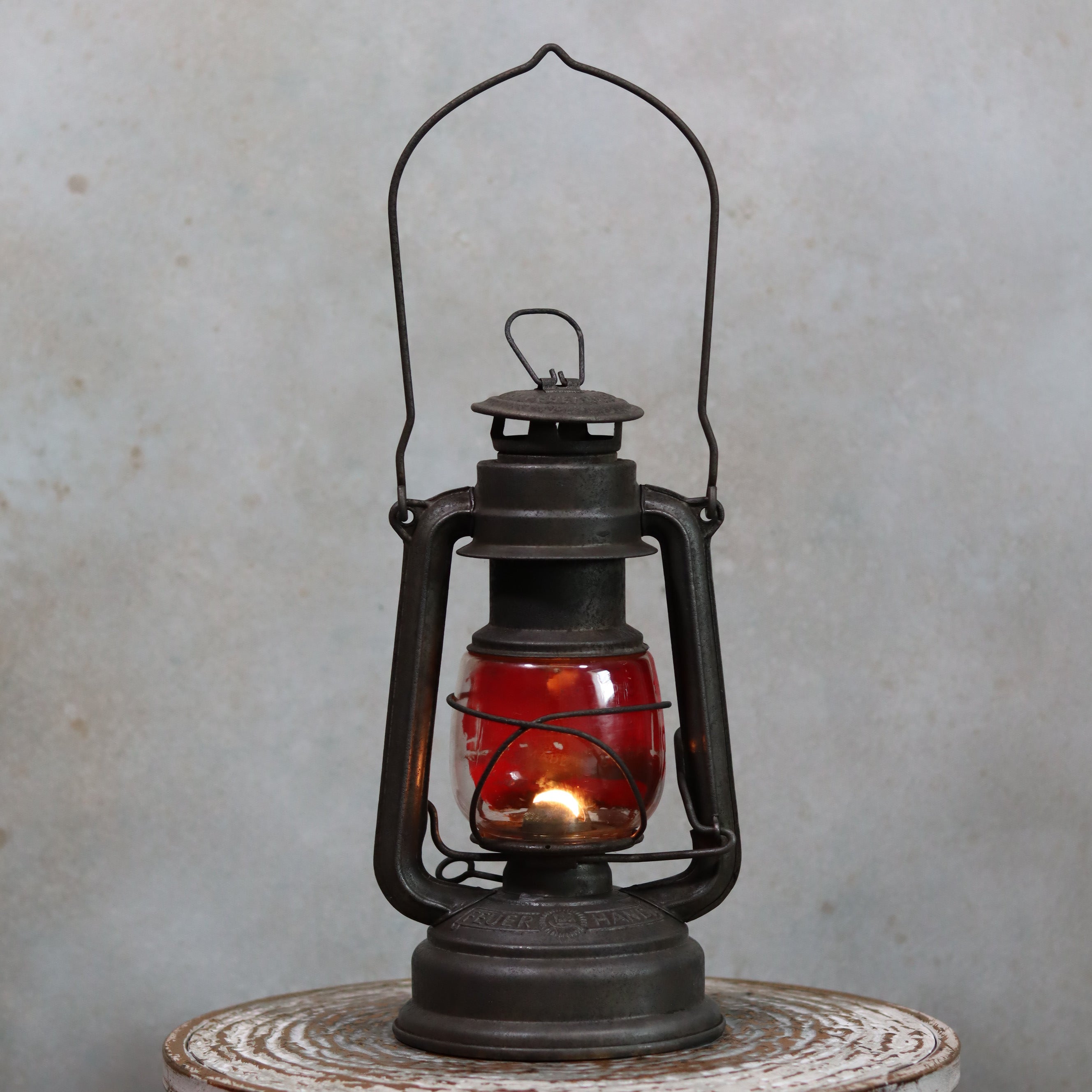 Vintage Feuerhand Hurricane Lantern – Model 276 (1950s) with rare glass featuring classic oil lamp design and metal frame