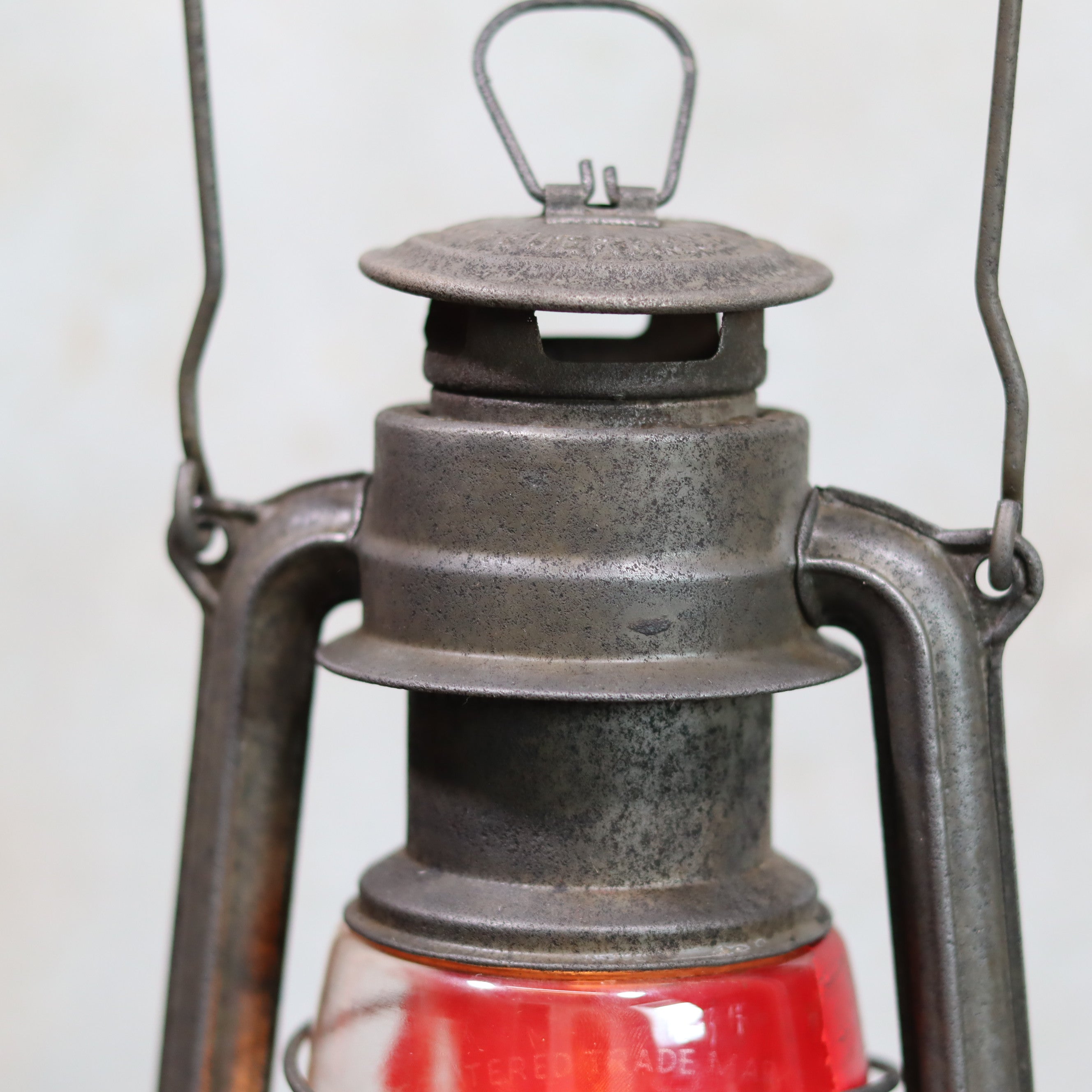 Vintage Feuerhand Hurricane Lantern – Model 276 (1950s) with rare glass showcasing classic metal oil lamp design and craftsmanship