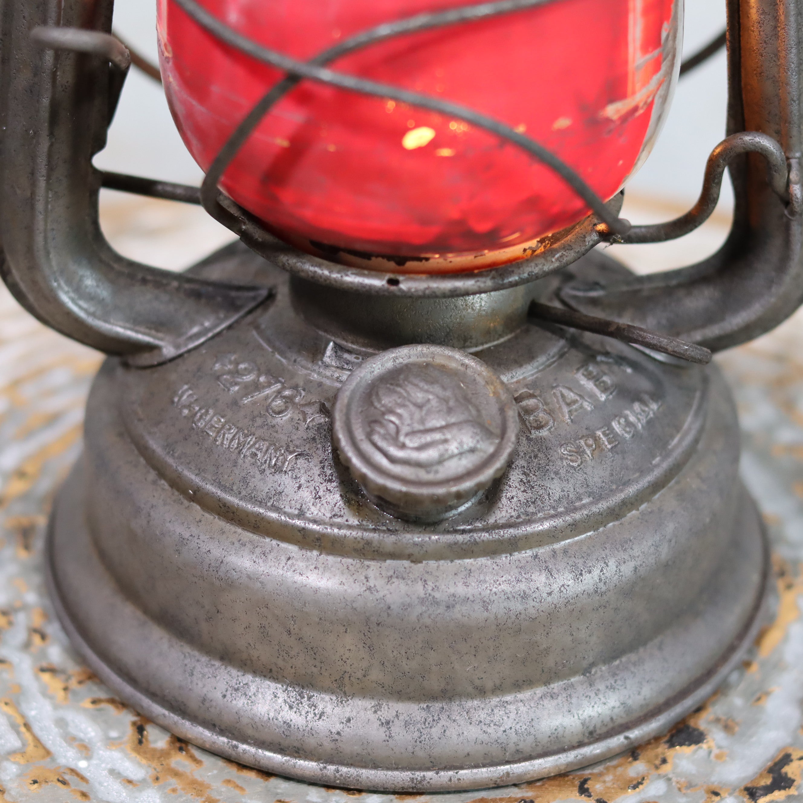Close-up of Vintage Feuerhand Hurricane Lantern – Model 276 (1950s) with rare glass oil lamp base and metal details