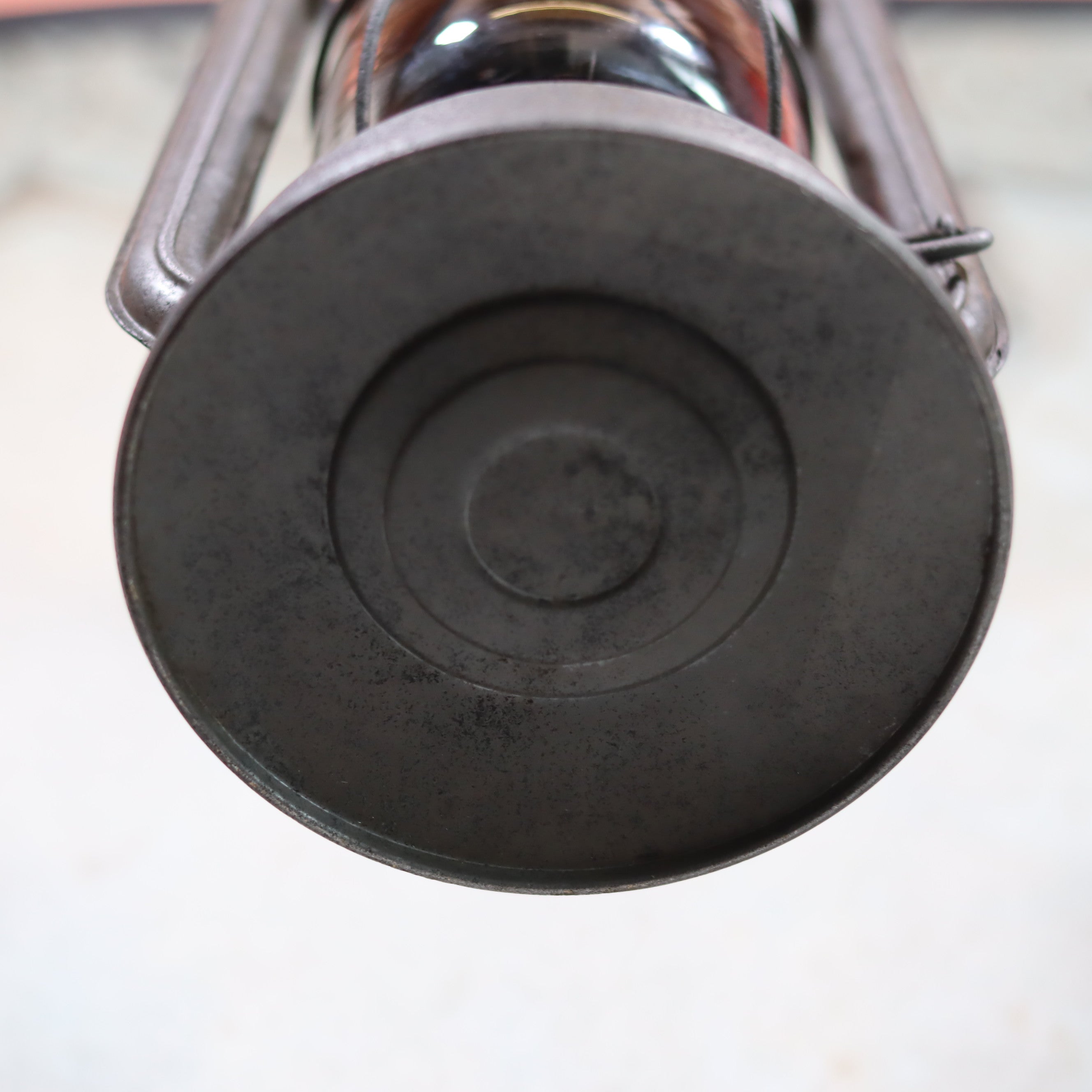 Bottom view of Vintage Feuerhand Hurricane Lantern – Model 276 (1950s) with rare glass showing metal base and support structure