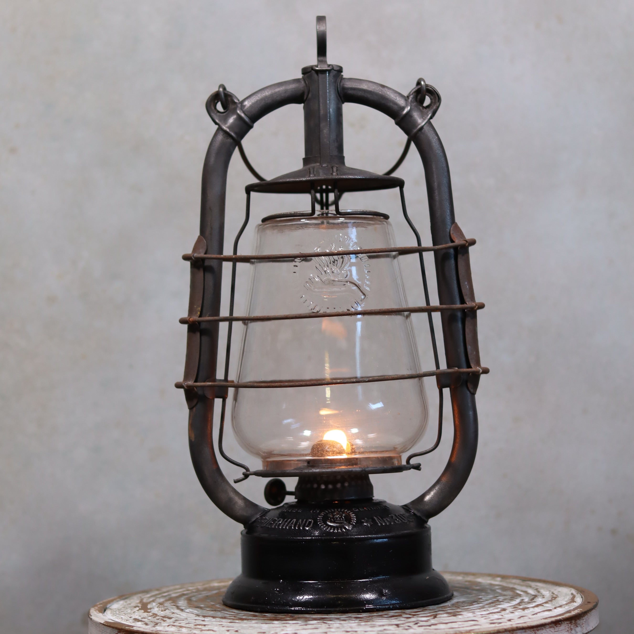 Rare Feuerhand 305 Hurricane Lantern – German Vintage Model with Black Tank (1930–1941) oil lamp lit indoors