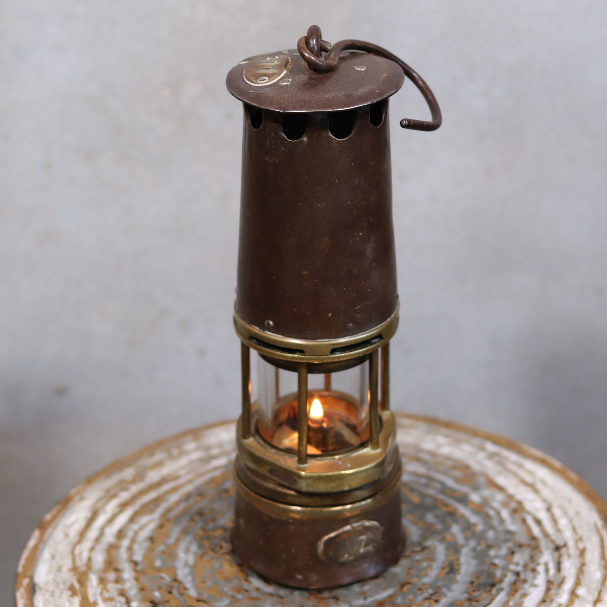 Heavy Vintage Mining Lamp – Numbered 77 – Jenaer Glass – 1930s–1950s with lit oil lamp inside metal casing