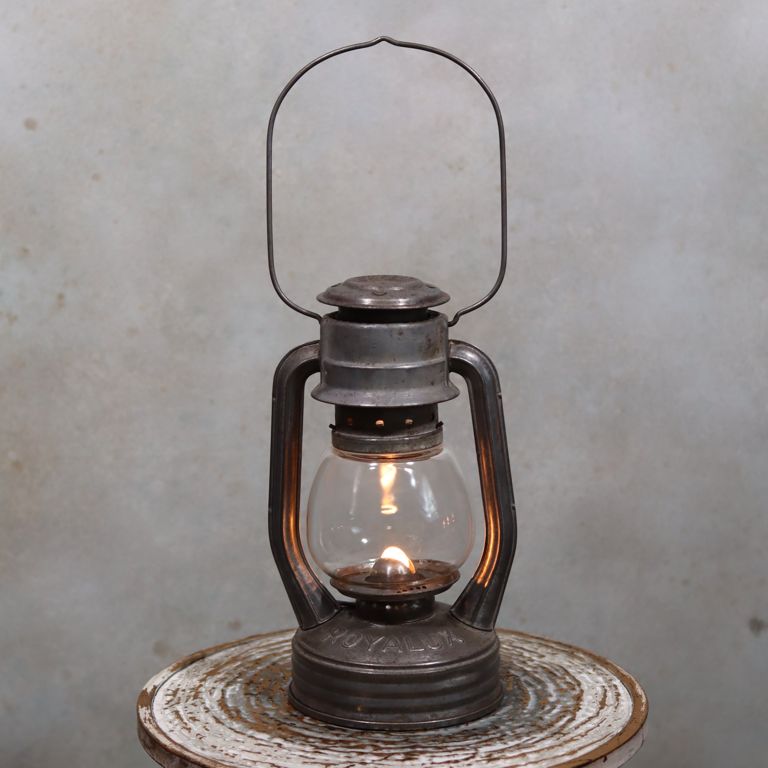 Vintage French Royalux Hurricane Lantern – Glass Lift Mechanism (27 cm) glowing oil lamp with classic metal frame design