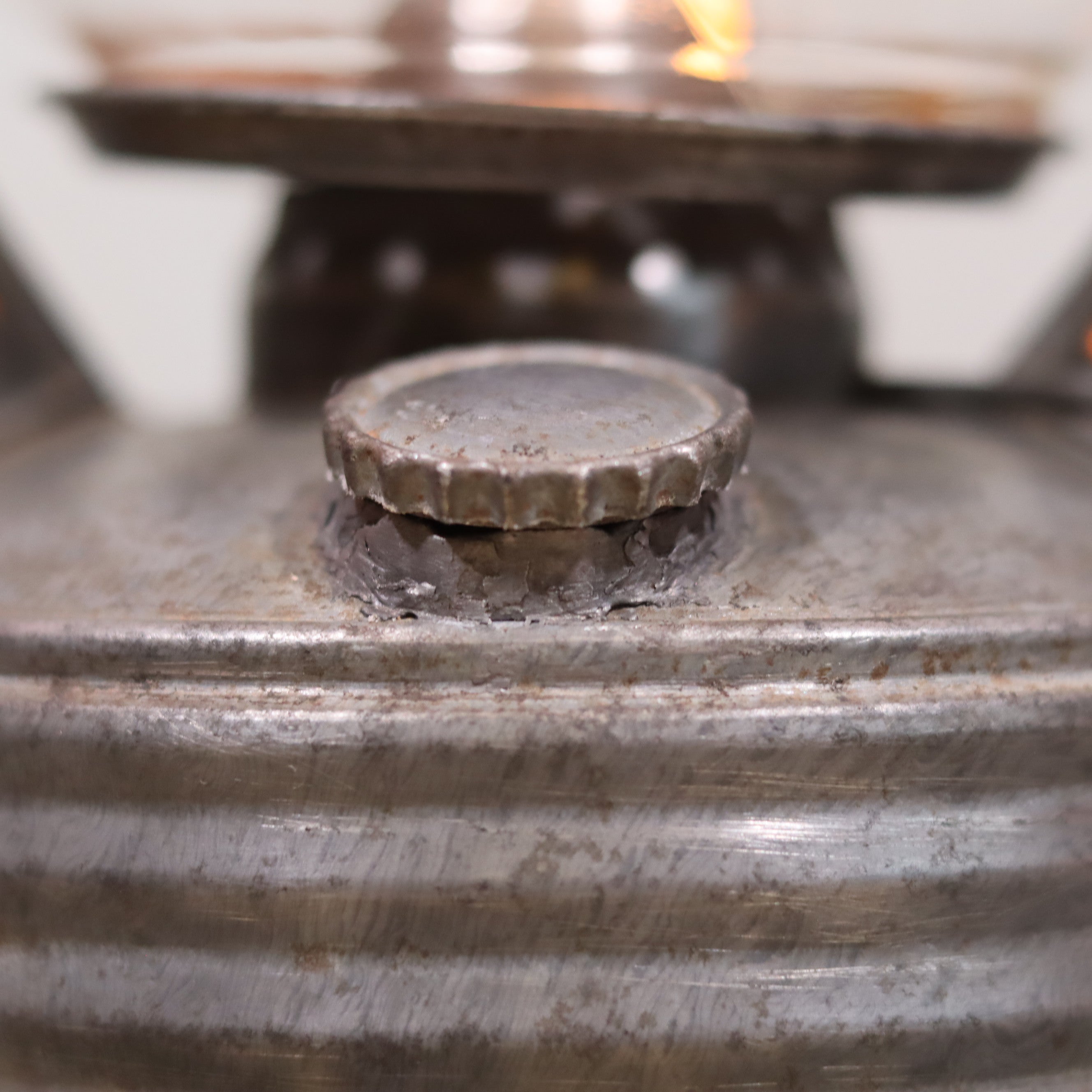 Close-up of the metal fuel cap on the Vintage French Royalux Hurricane Lantern – Glass Lift Mechanism (27 cm) oil lamp