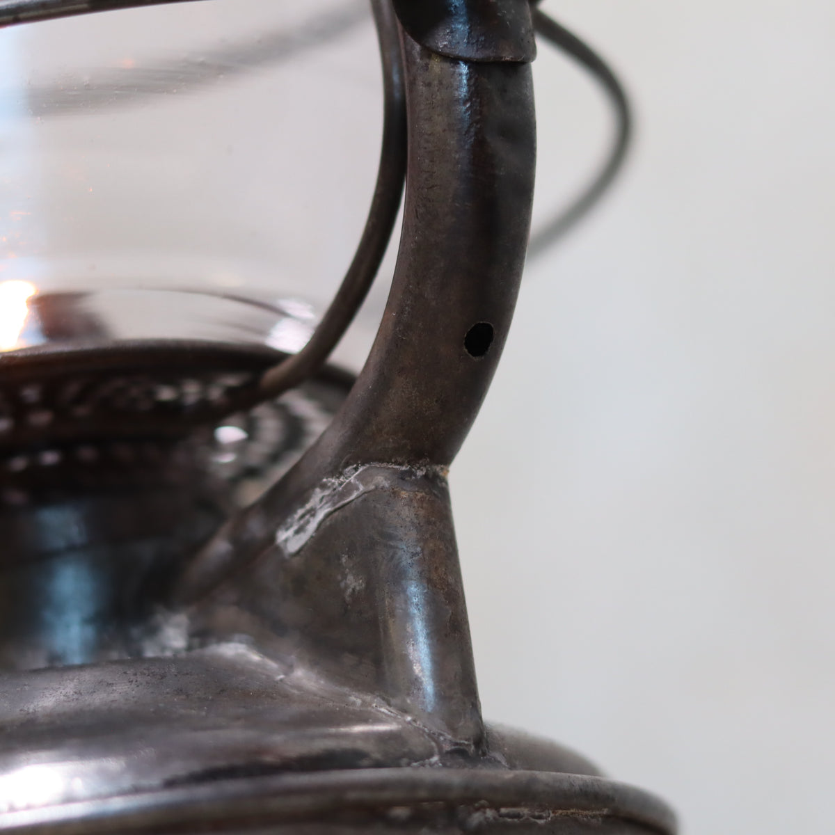 Close-up of metal handle detail on Rare French Hurricane Lantern – “La Lumineuse” by SIF (1920s–1930s) oil lamp