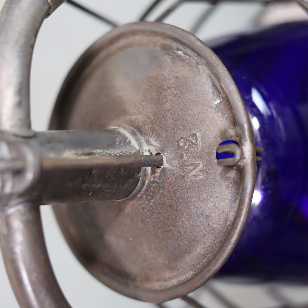 Rare Vintage ALG No. 2 French Hurricane Lantern – 1960s/70s – Blue Glass & Unique Handle close-up on metal oil lamp top with engraved No 2 mark