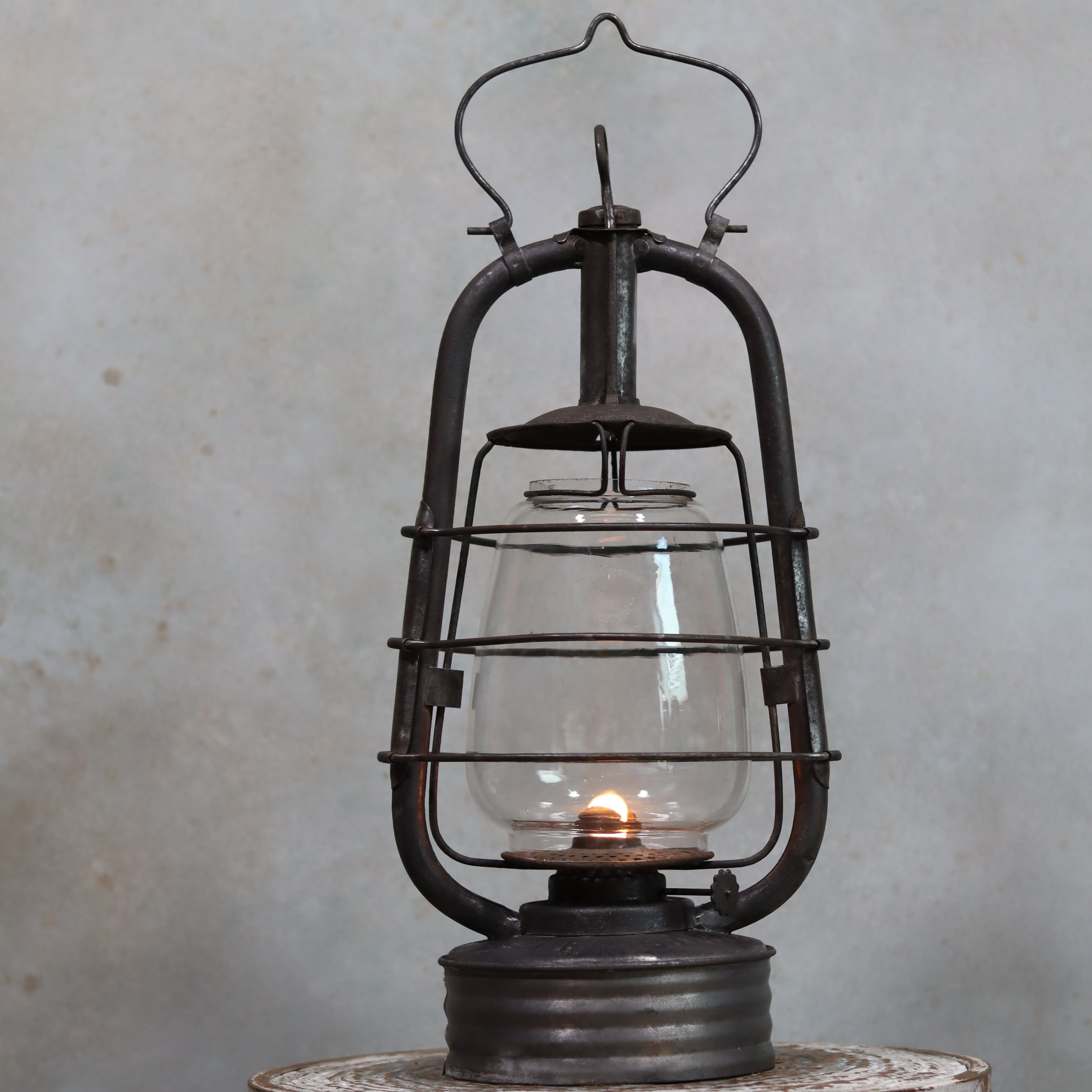 Vintage French Hurricane Lantern – SIF 500 – Cristal Supérieur Glass – 1950s–1970s oil lamp with rustic metal frame glowing warmly