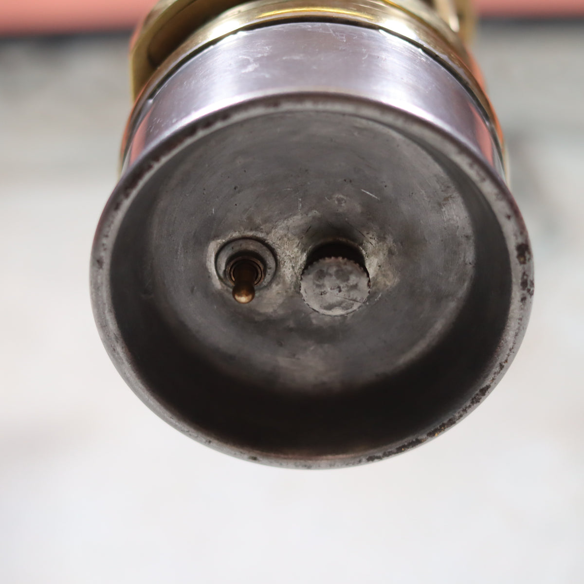 Close-up view of the metal base of the Rare New Old Stock Mining Lamp – Hubert Joris (Circa 1900–1910) oil lamp