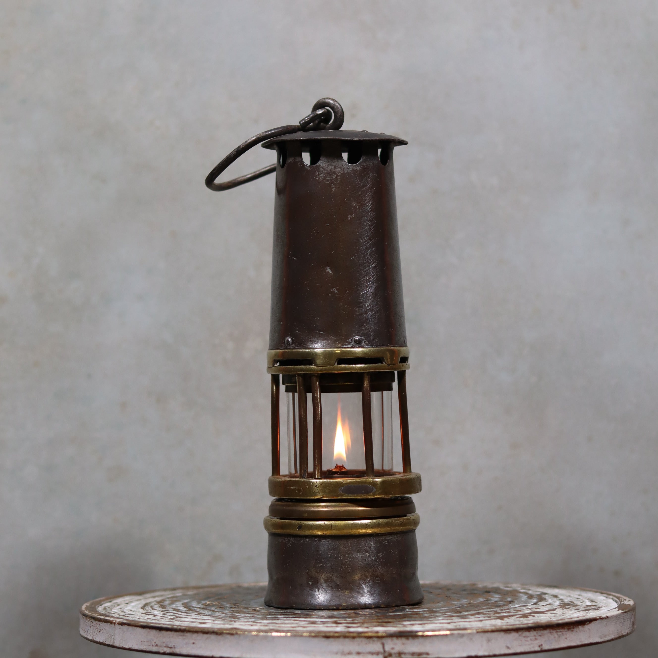 Antique Mining Lamp – Hubert Joris – Circa 1900–1910 – Belgian Master Miner’s Lamp with lit oil lamp inside metal casing