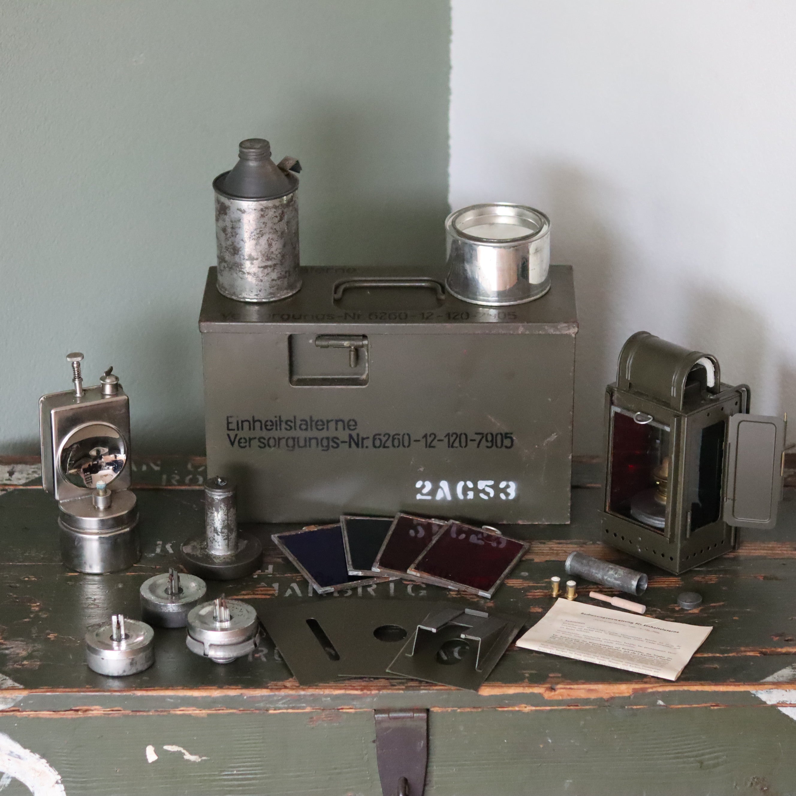 Rare German Military Lantern Set – Einheitslaterne 2AG53 with Multi-Fuel Options and Accessories (Osmeka, 1950s–1960s)