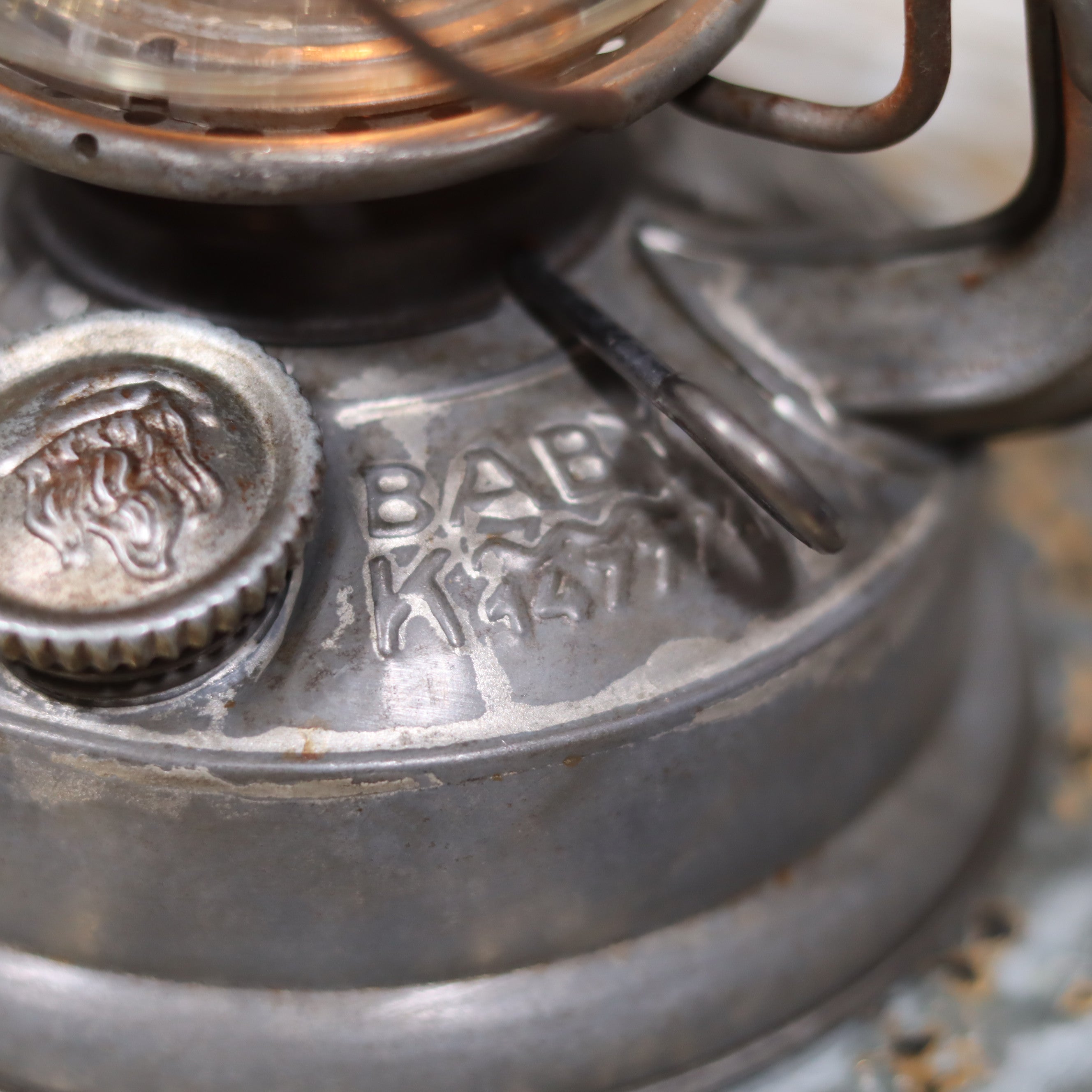 Close-up of Vintage Feuerhand Baby 275 Hurricane Lantern – Western Germany (1950s, Marked K1477/1) oil lamp details on metal base