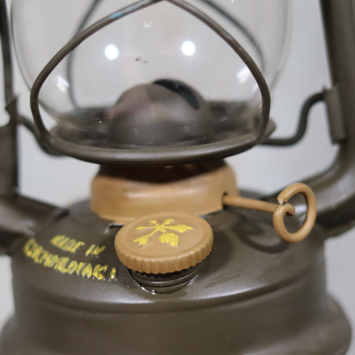 Close-up of Vintage Czech Storm Lantern – Meva 863 – Made in Czechoslovakia – 1982 – Beautiful Painted Finish showing oil lamp details and brand markings