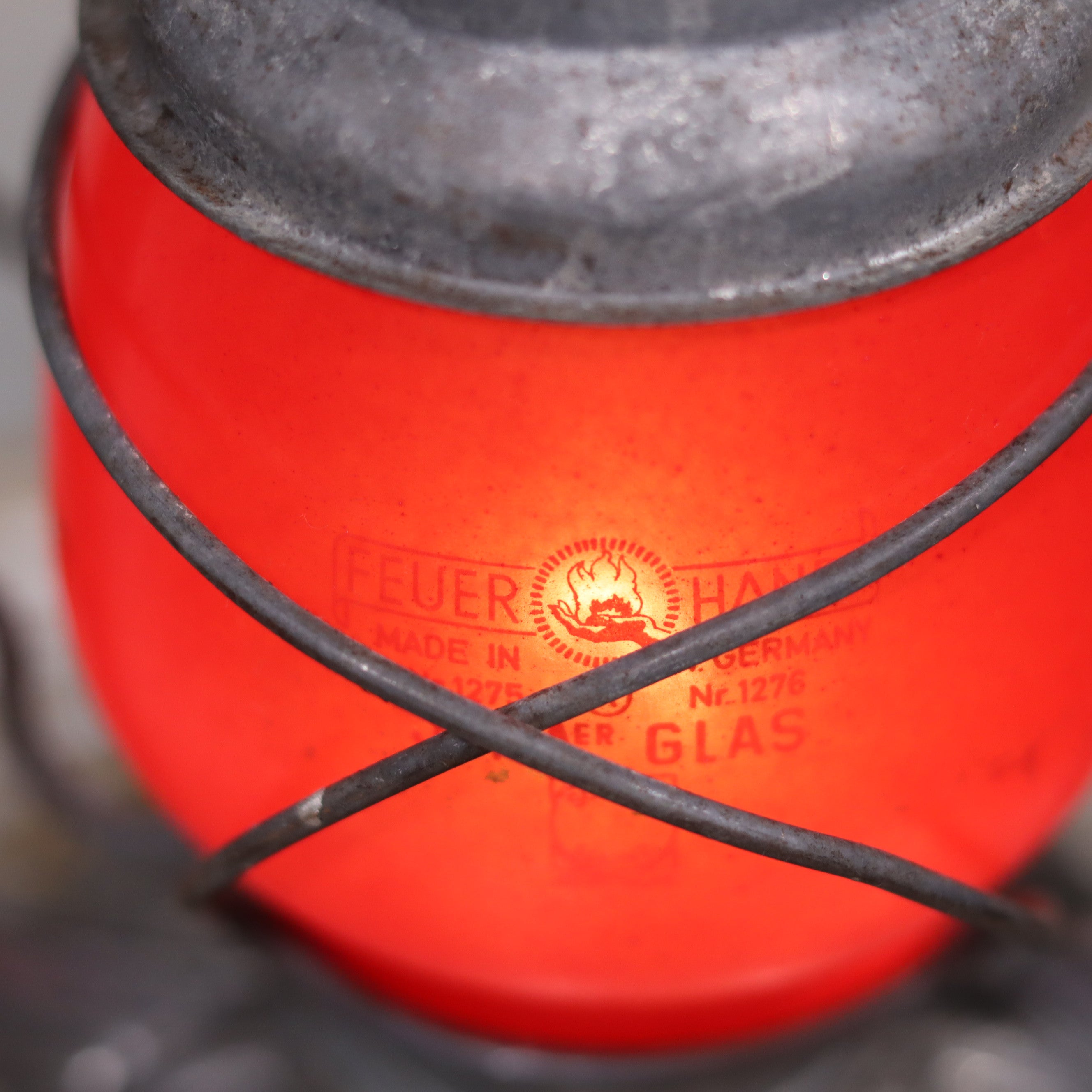 Vintage Feuerhand Baby 275 Hurricane Lantern – Western Germany – Red Glass close-up showing brand and red glass oil lamp details