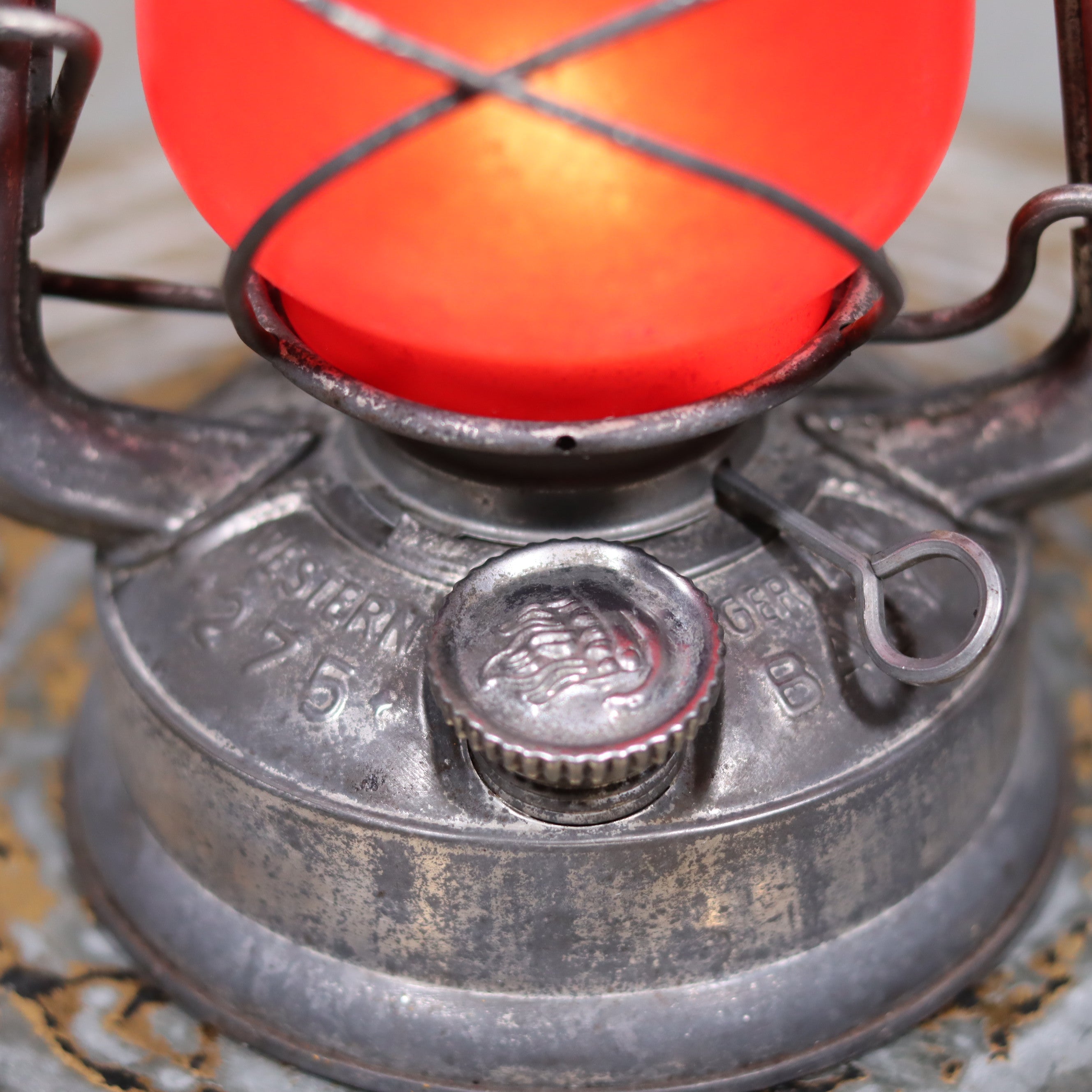 Close-up of the oil burner detail on the Vintage Feuerhand Baby 275 Hurricane Lantern – Western Germany – Red Glass