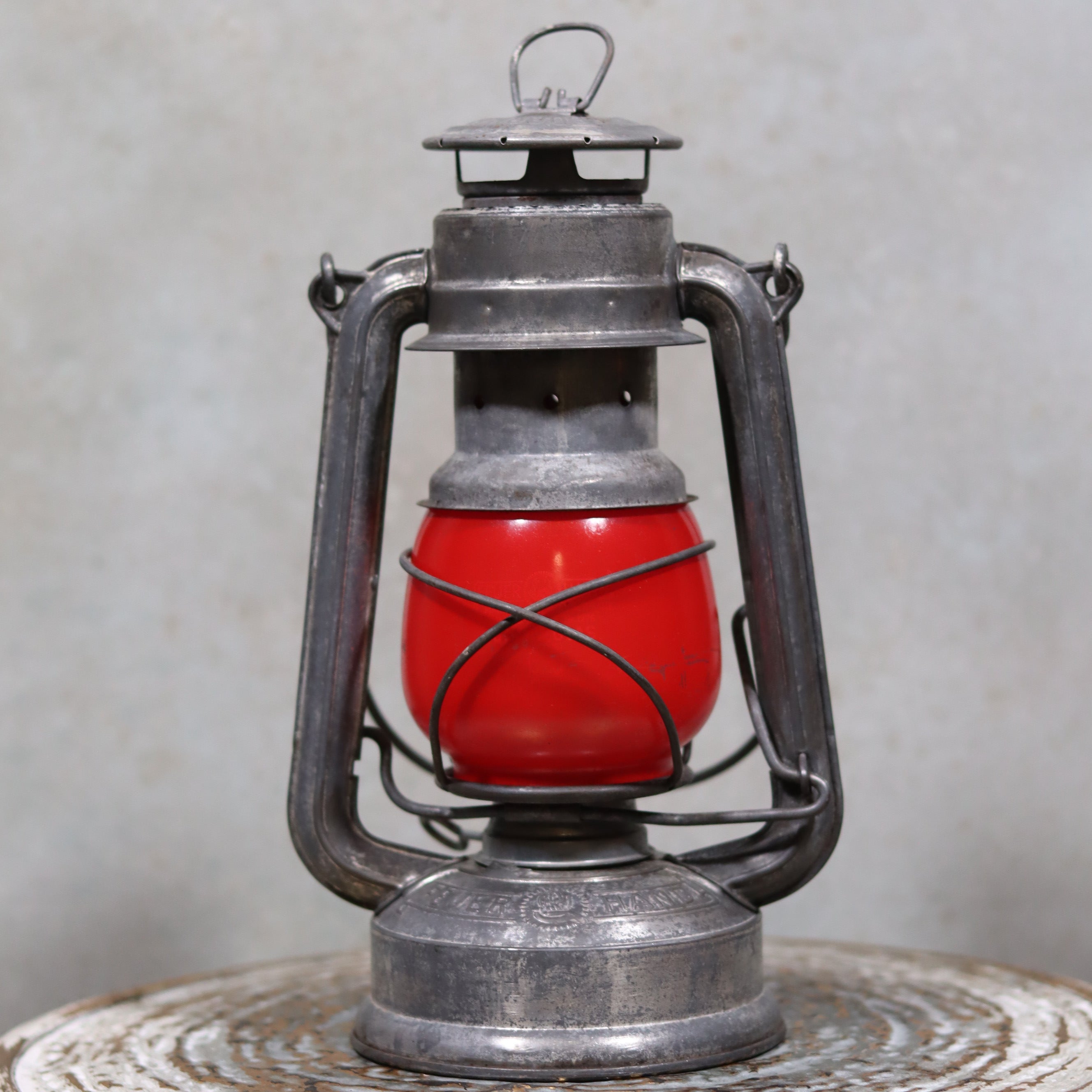 Vintage Feuerhand Baby 275 Hurricane Lantern – Western Germany – Red Glass oil lamp with classic metal frame and vibrant red globe