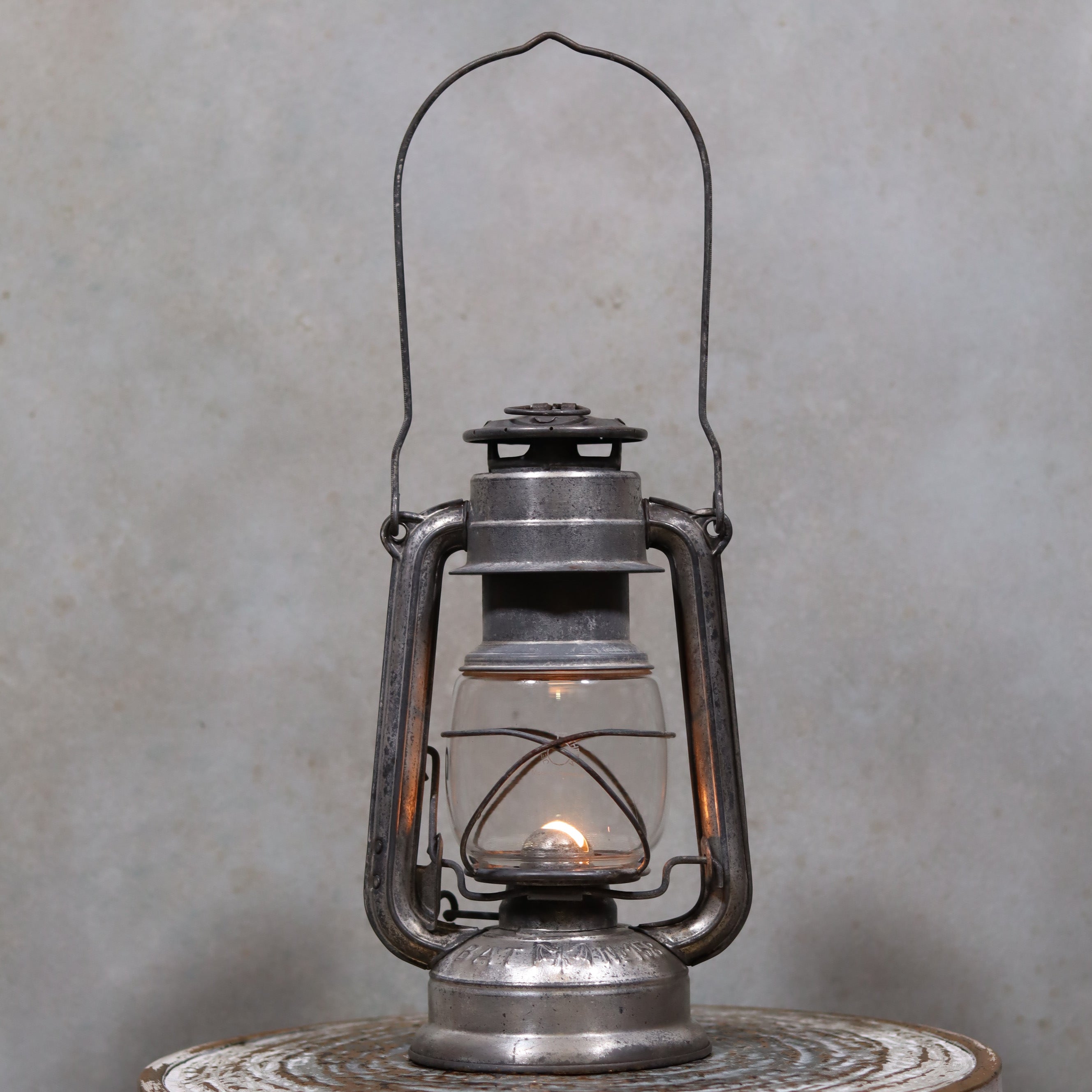 Vintage German Hurricane Lantern – Bat No. 158 – Made in Germany – 1950s/60s – Jena Glass oil lamp with lit flame and metal frame