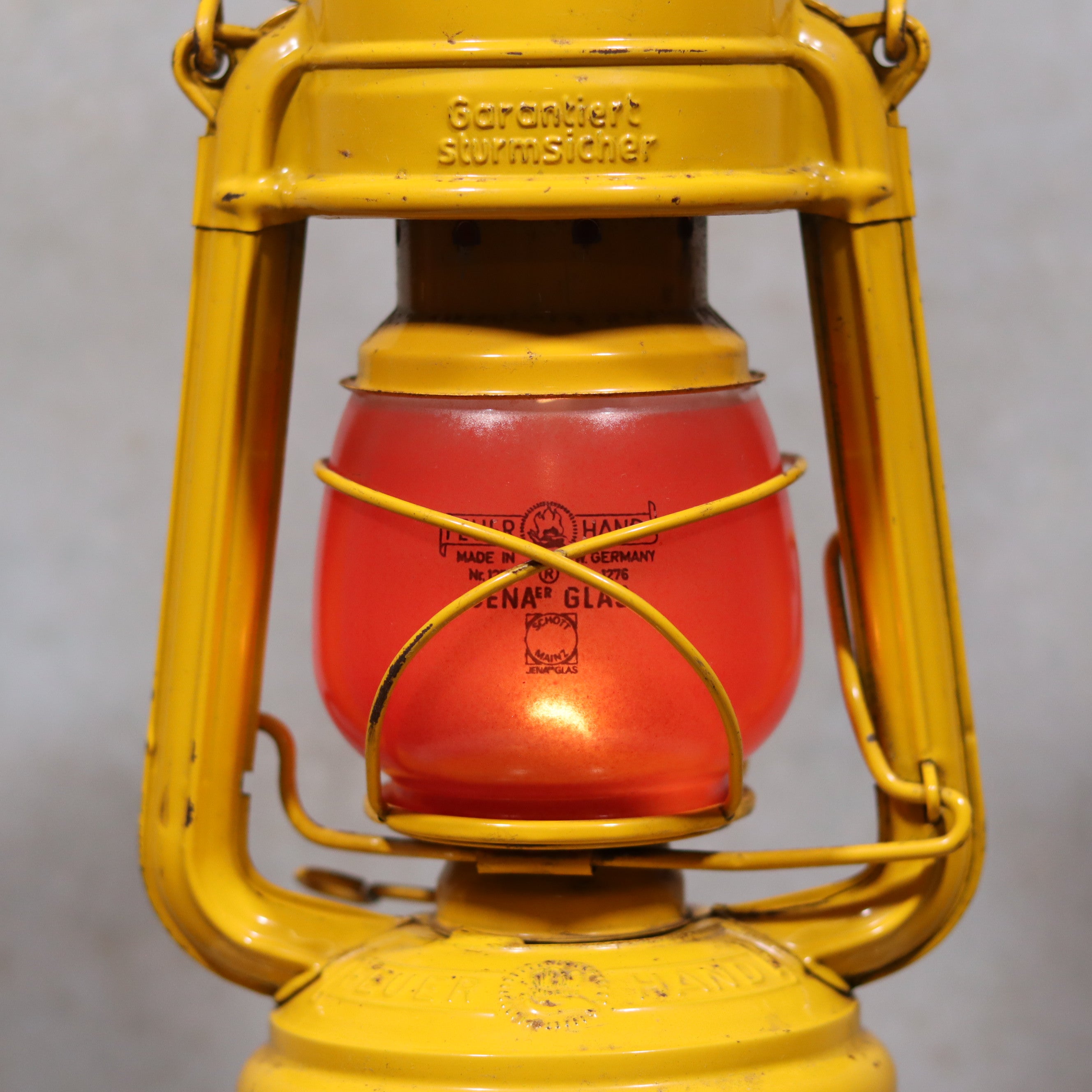 Vintage Feuerhand Hurricane Lantern – Baby Special 276 STK/70 safety lantern with distinct yellow frame and red glass oil lamp