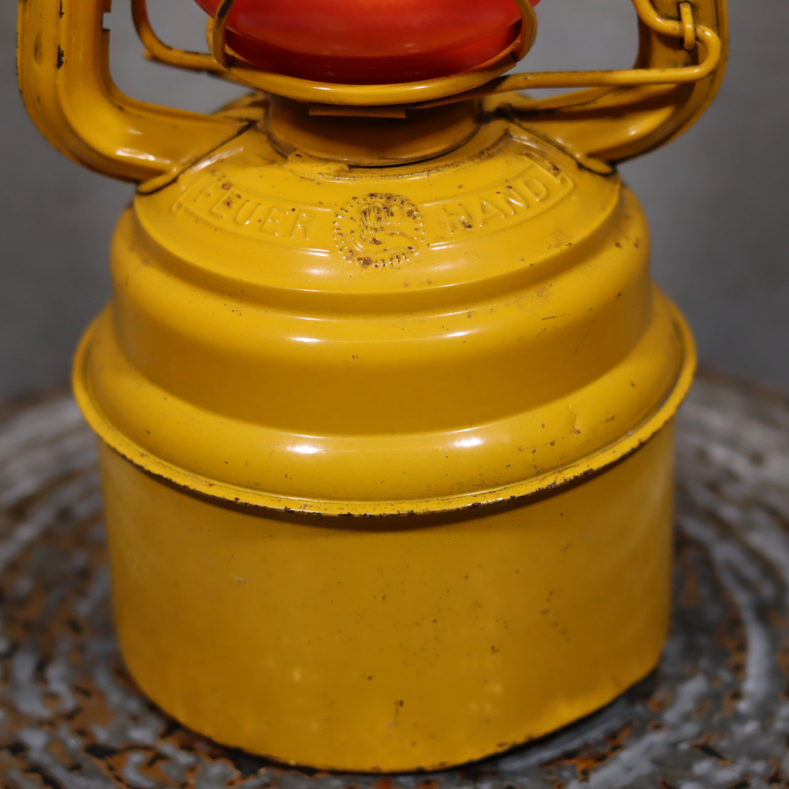 Close-up of yellow oil lamp detail on Vintage Feuerhand Hurricane Lantern – Baby Special 276 STK/70 Safety Lantern with 70-hour burn time
