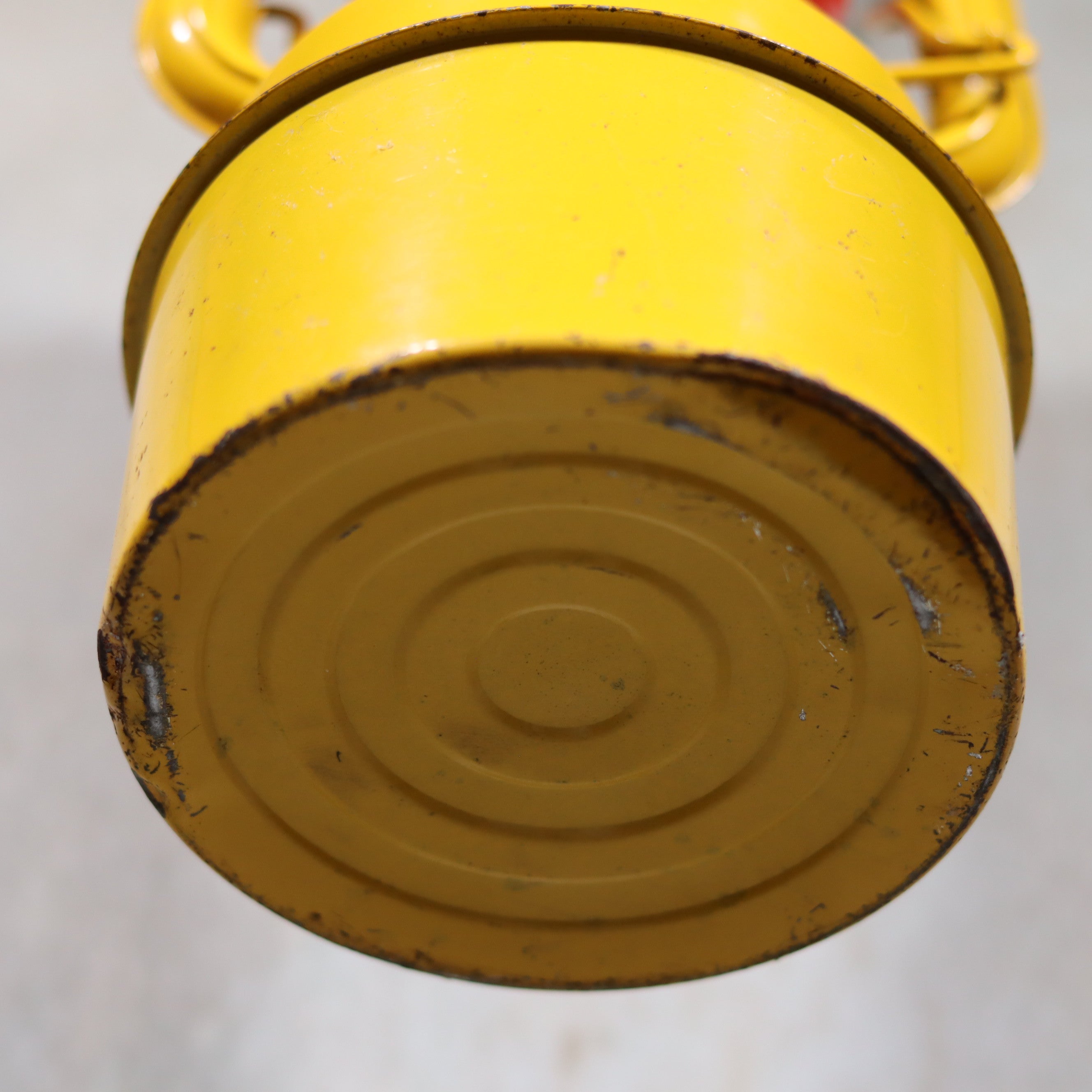 Vintage Feuerhand Hurricane Lantern – Baby Special 276 STK/70 yellow oil lamp base showing wear and brand quality craftsmanship