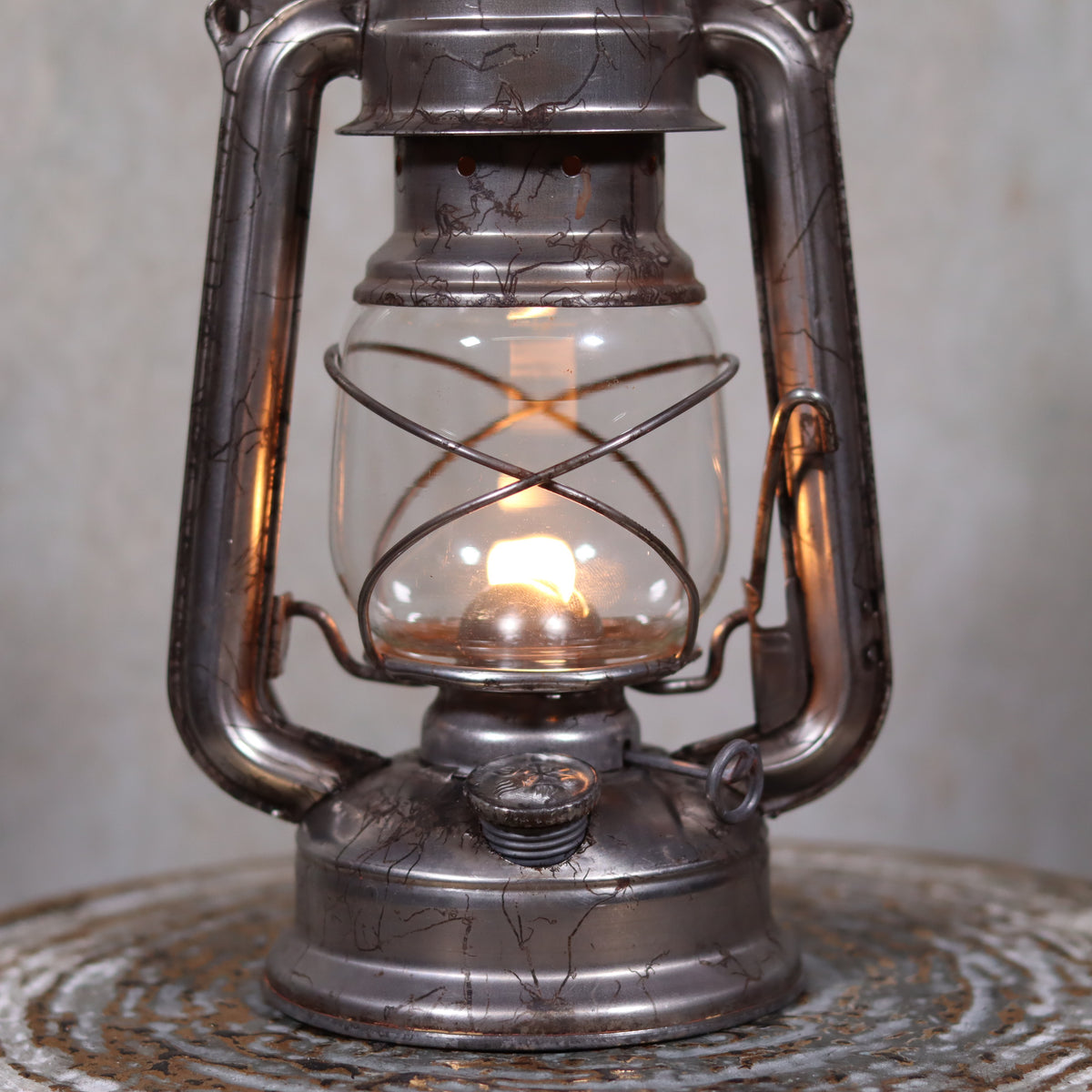 Vintage Czech Storm Lantern – Meva 863 – Made in Czechoslovakia – 1971 – Original Glass oil lamp lit close-up view