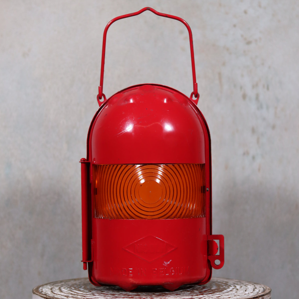 NOS Vintage Nicoln Flashing Oil Lamp – Road Worker Lantern with Original Manual in red metal and amber lens close-up view