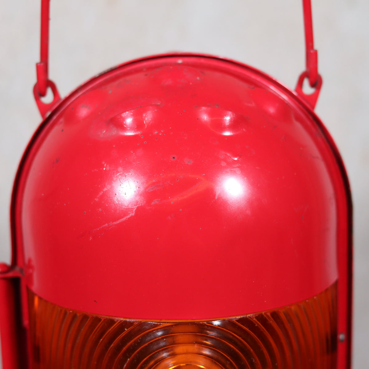 NOS Vintage Nicoln Flashing Oil Lamp – Road Worker Lantern with Original Manual close-up showing red metal top and amber lens