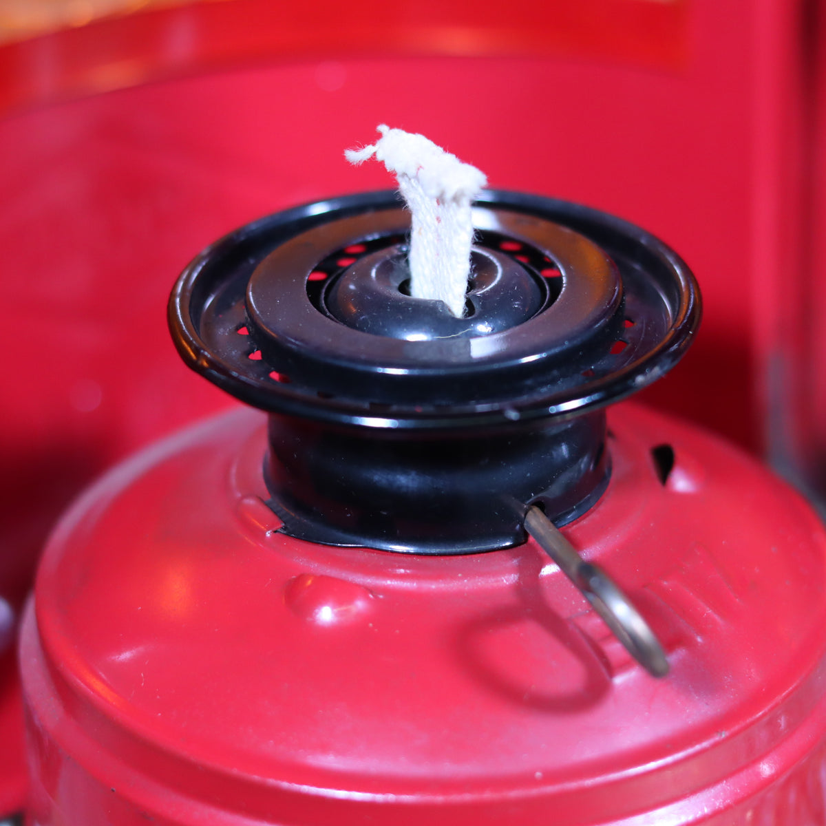 Close-up of the wick and burner of the NOS Vintage Nicoln Flashing Oil Lamp – Road Worker Lantern with Original Manual