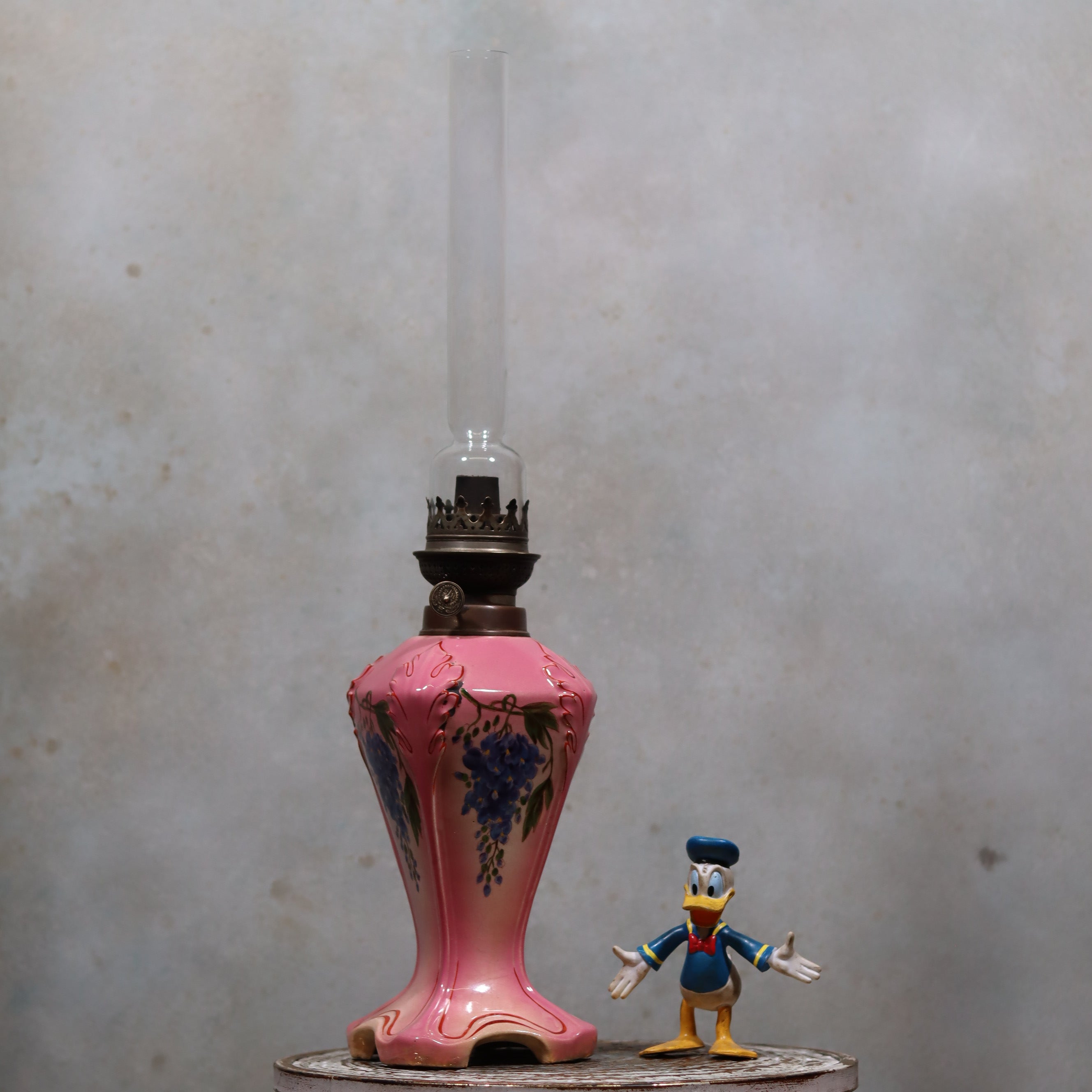 Elegant Vintage Porcelain Oil Lamp – Pink with Grape Motif – Hugo Schneider Burner – 1930s standing tall with intricate design details