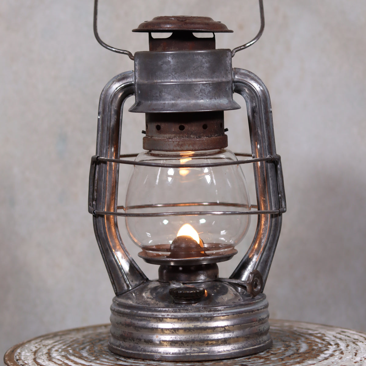Vintage French Royalux Hurricane Lantern – Rare Glass Lift & Cage (27 cm) oil lamp with flame and metal frame detail