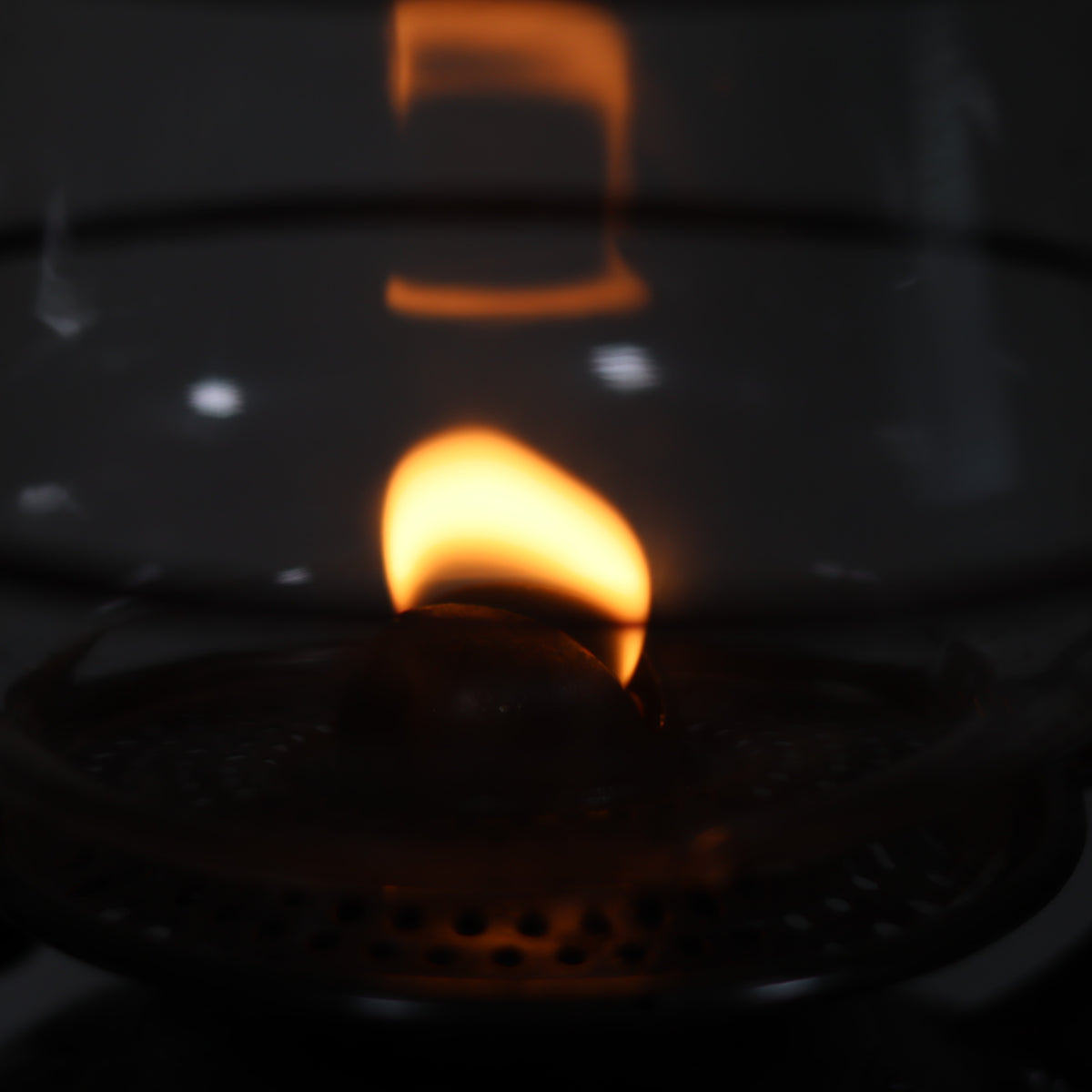 Vintage Feuerhand 323 Storm Lantern – Late 1930s oil lamp lit with flame inside embossed glass housing