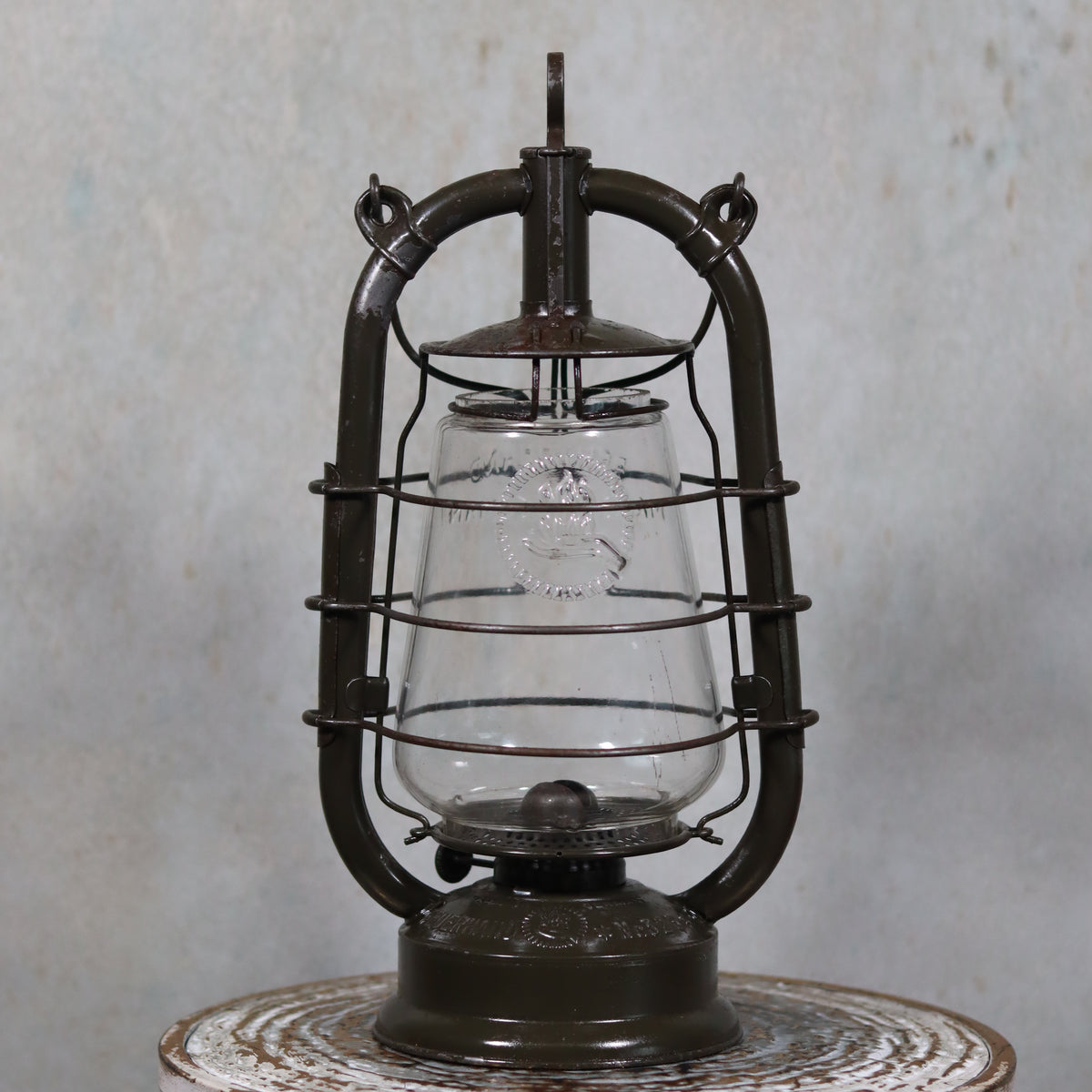 Vintage Feuerhand 323 Storm Lantern – Late 1930s with original paint and embossed glass oil lamp design.