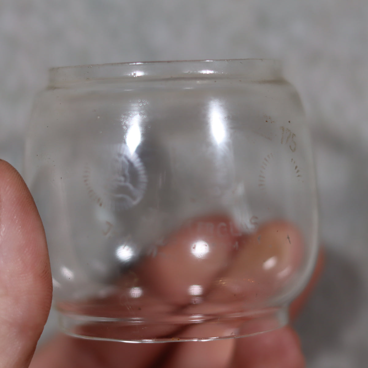 Original glass from Rare Feuerhand 176 Storm Lantern – “Pilzkopf” Design oil lamp from the 1940s held in hand