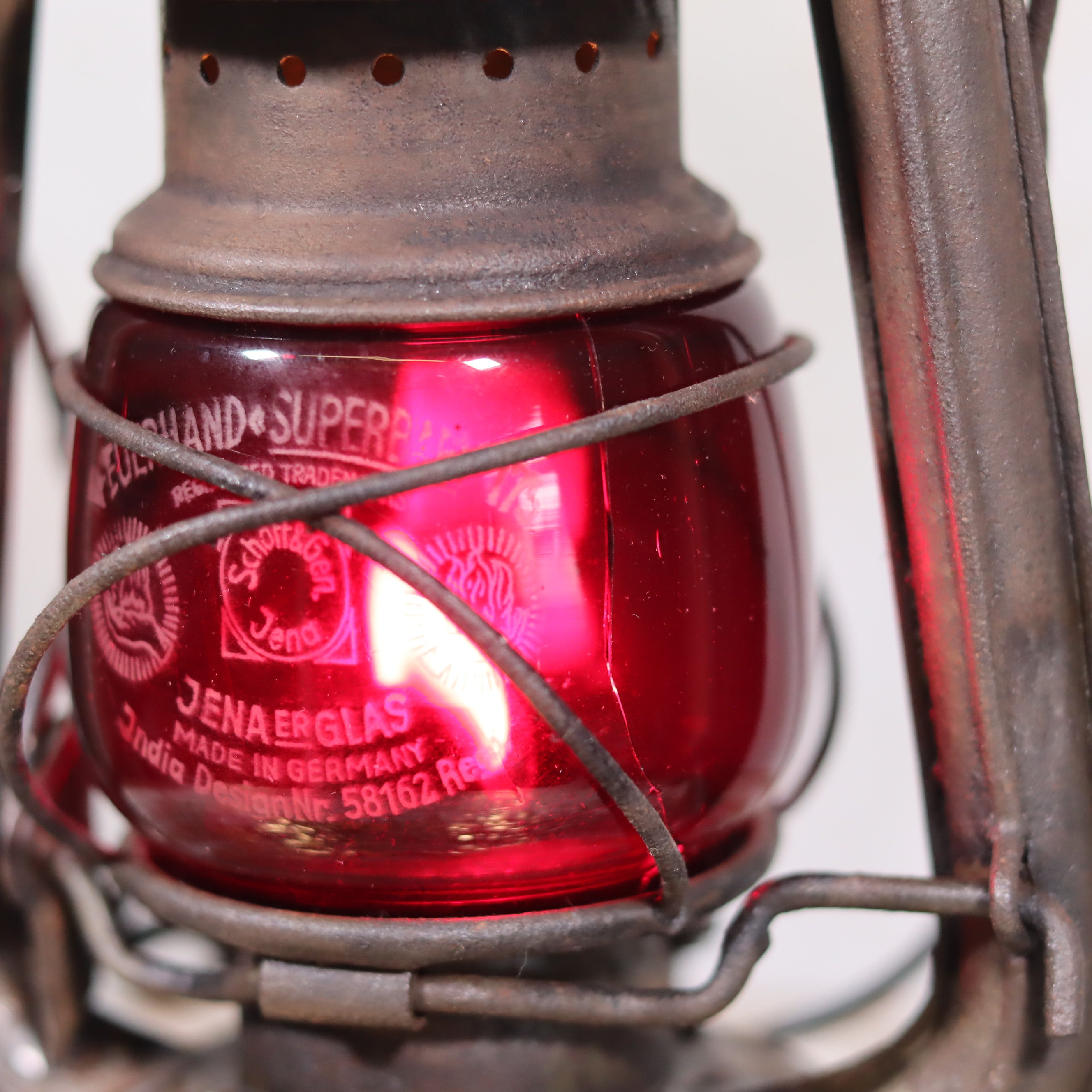 Close-up of Vintage Pre-War Storm Lantern – Feuerhand 175 (1930s) with Red Glass oil lamp details