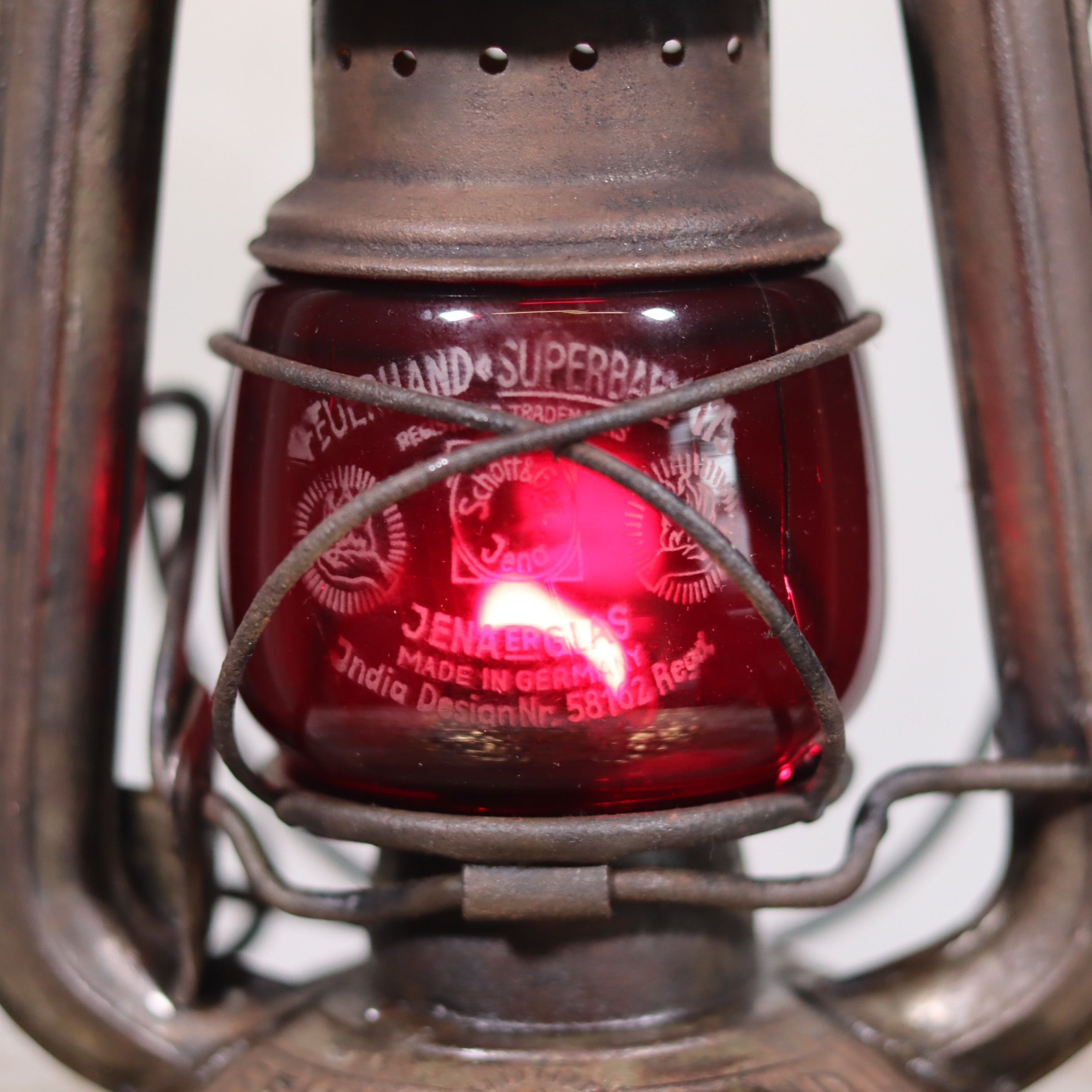 Vintage Pre-War Storm Lantern – Feuerhand 175 (1930s) with Red Glass showing detailed red glass oil lamp element