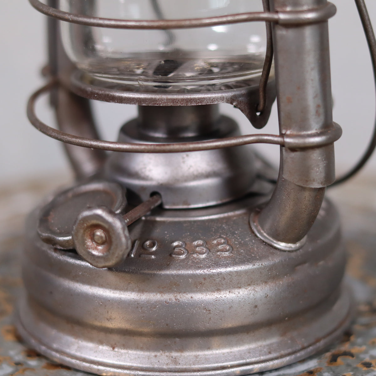 Close-up of oil lamp details on Extremely Rare Pre-War Storm Lantern – Hasag Orkan No. 333 (1937–1939) showing metalwork and glass.