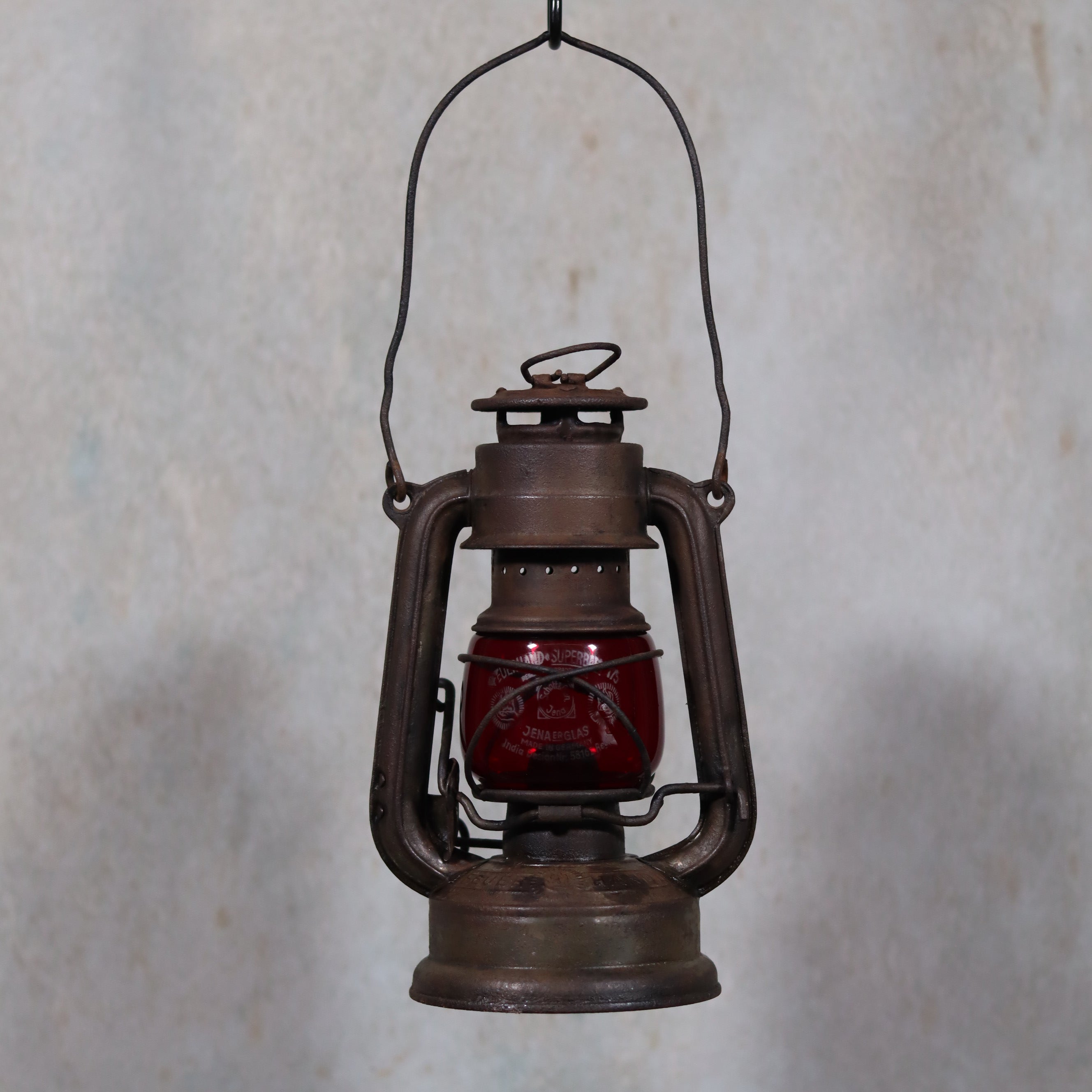 Vintage Pre-War Storm Lantern – Feuerhand 175 (1930s) with Red Glass hanging oil lamp in rustic metal frame