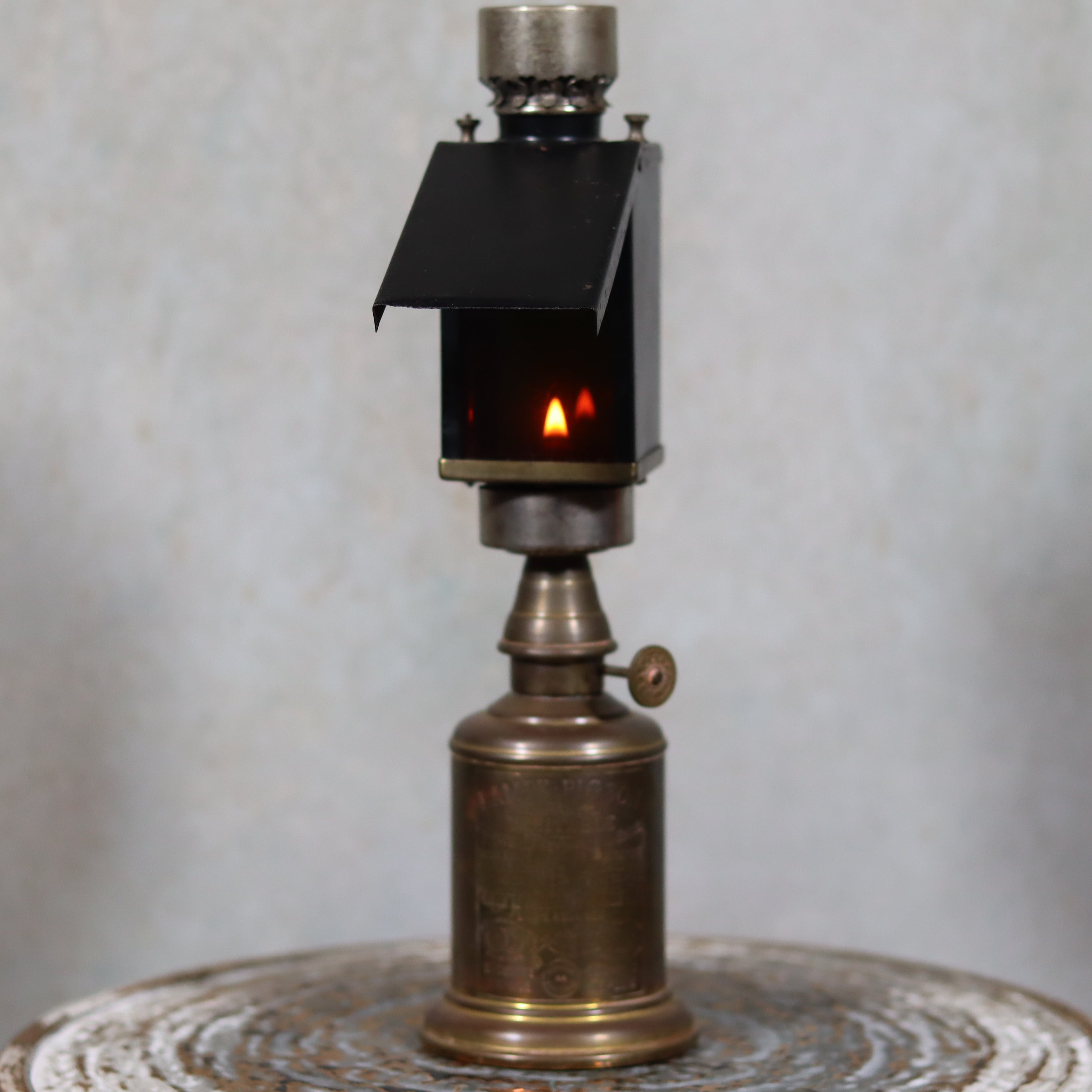 Rare Darkroom Oil Lamp – Pigeon Lamp with “Lampe Junius” Attachment – Excellent Condition showing lit flame and metal body