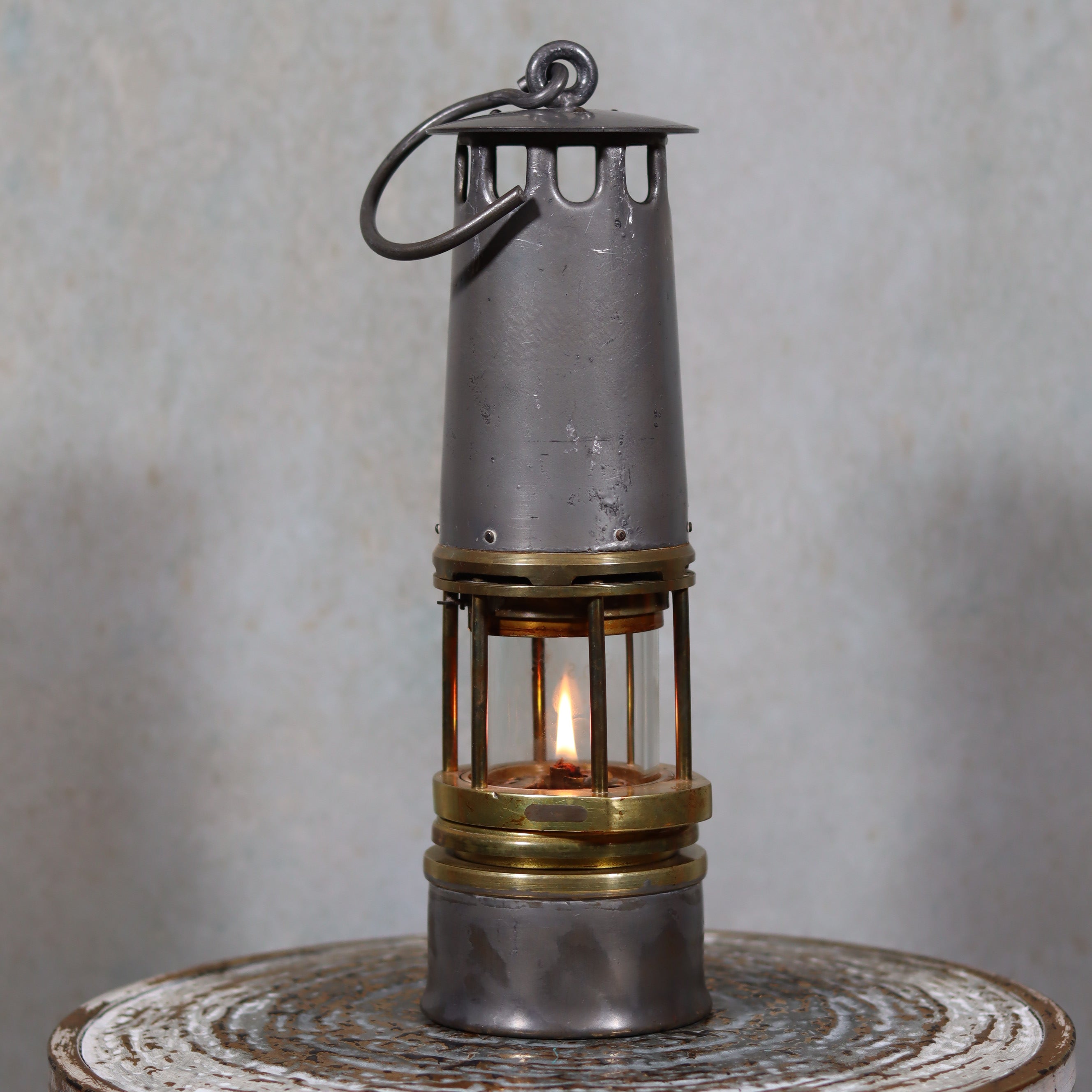 Beautiful, Almost Unused Miner’s Lamp by Hubert Joris (ca. 1900) with Val St. Lambert Glass showing detailed oil lamp design and flame