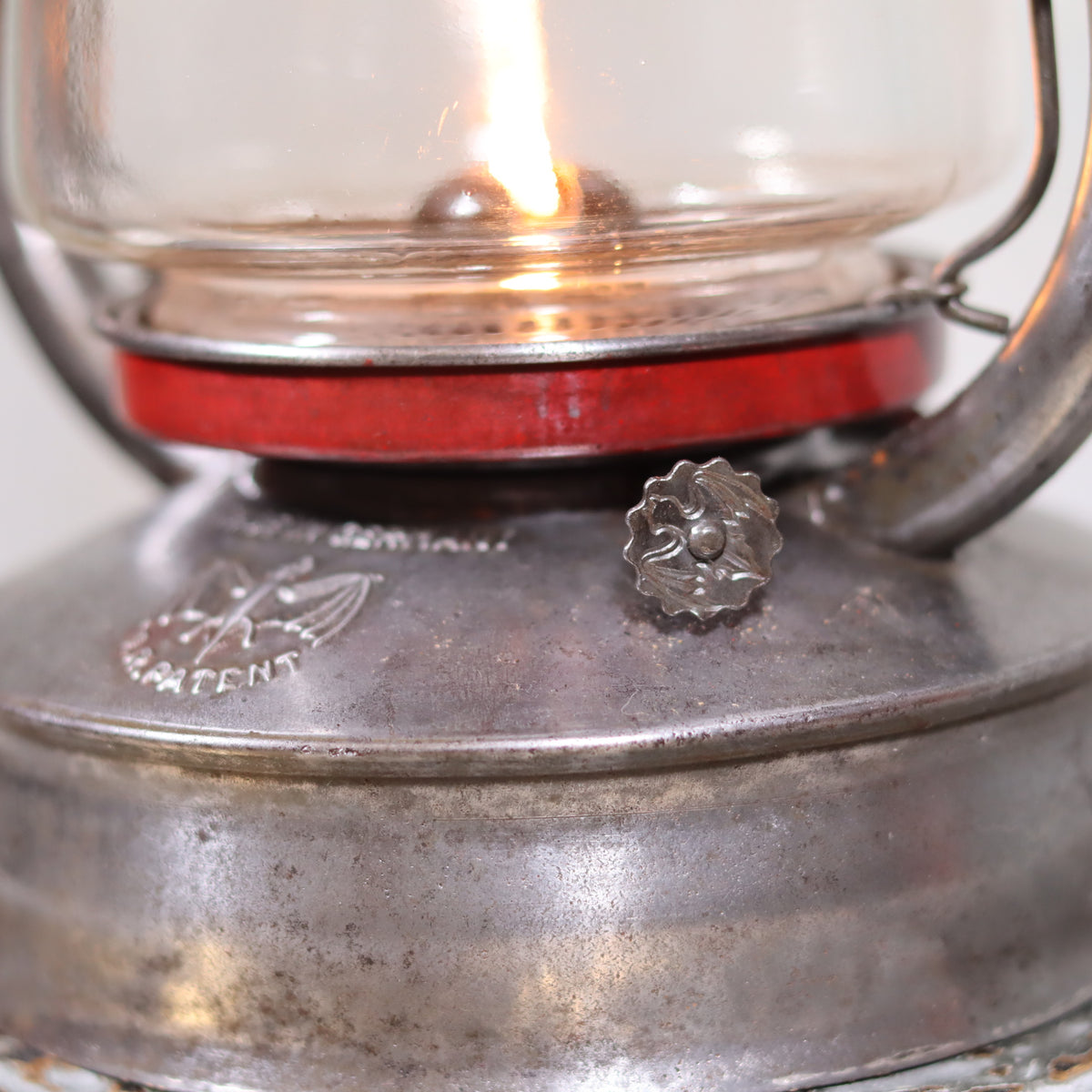 Exceptional Stübgen & Co. BAT 2850 Hurricane Lantern Germany ca 1939–1940 oil lamp with marked glass and red accents close-up view