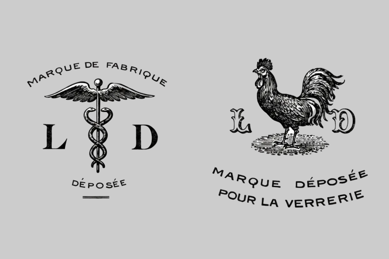 Two black and white vintage logos featuring the lamp brand initials L and D with a caduceus and a rooster design.