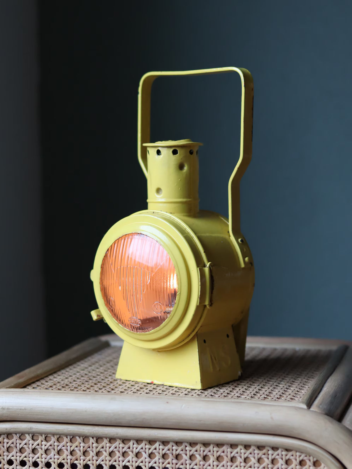 Vintage Dutch Railway Signal Lamp – NS Oil Lantern, 1930s in classic yellow with orange lens and metal handle detail