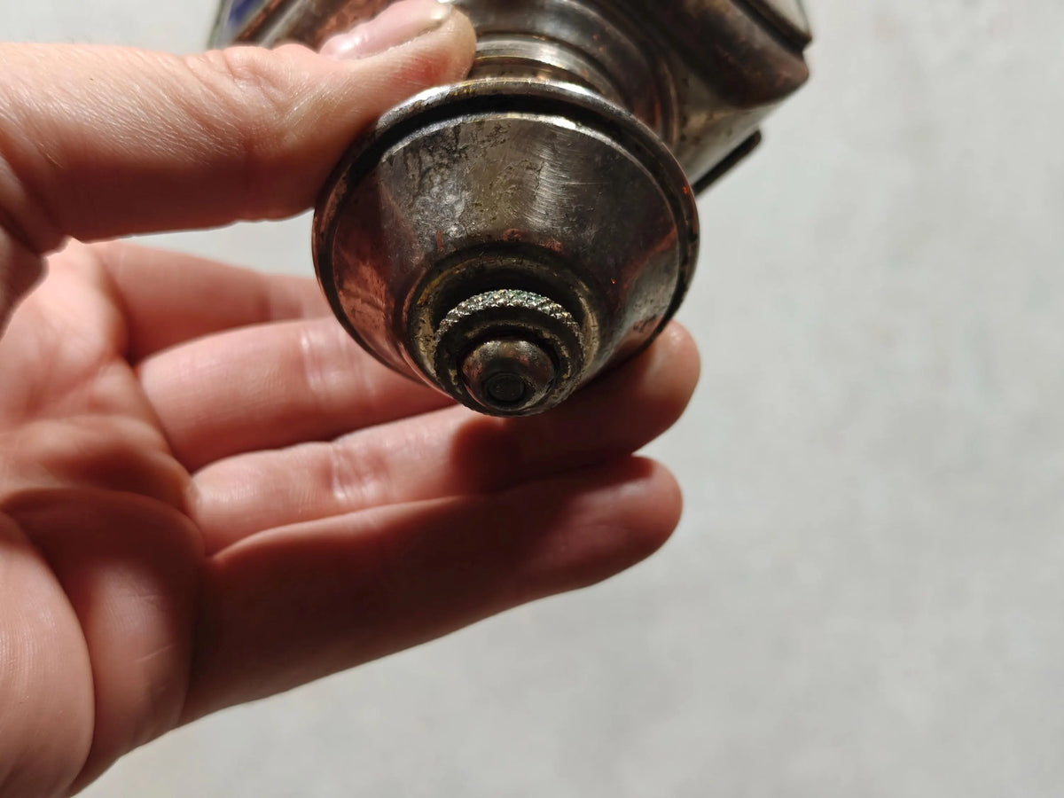 Extremely Rare Vintage Automobile Oil Lamp – Coll. J. Girard, Paris (1920s–1930s) held showing metal detailing and craftsmanship
