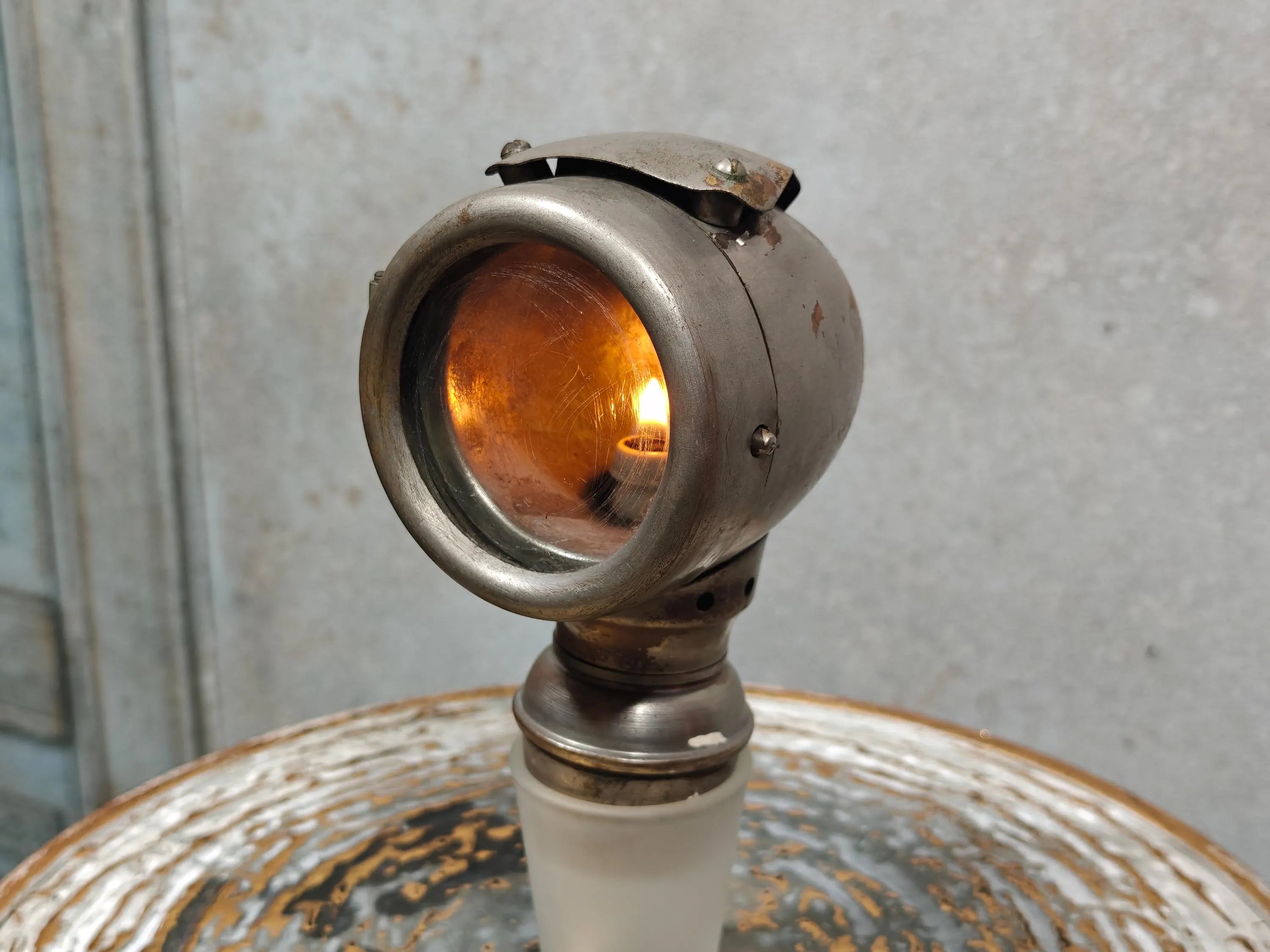 Rare Vintage Automobile Oil Lamp – French Side Lamp (1920s/30s) showing lit vintage automotive side oil lamp in metal casing