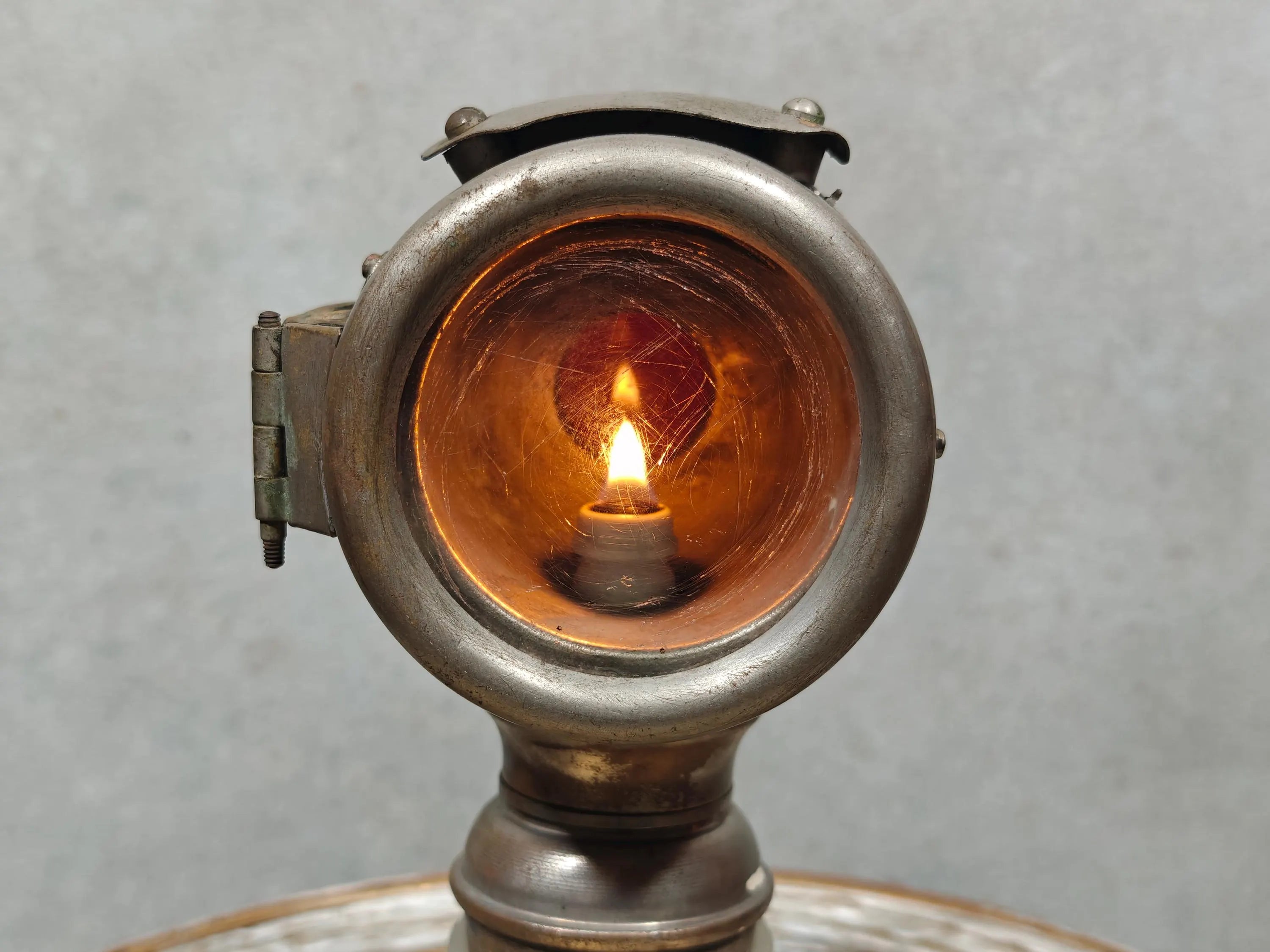Rare Vintage Automobile Oil Lamp – French Side Lamp (1920s/30s) showing the lit flame inside the classic oil lamp design
