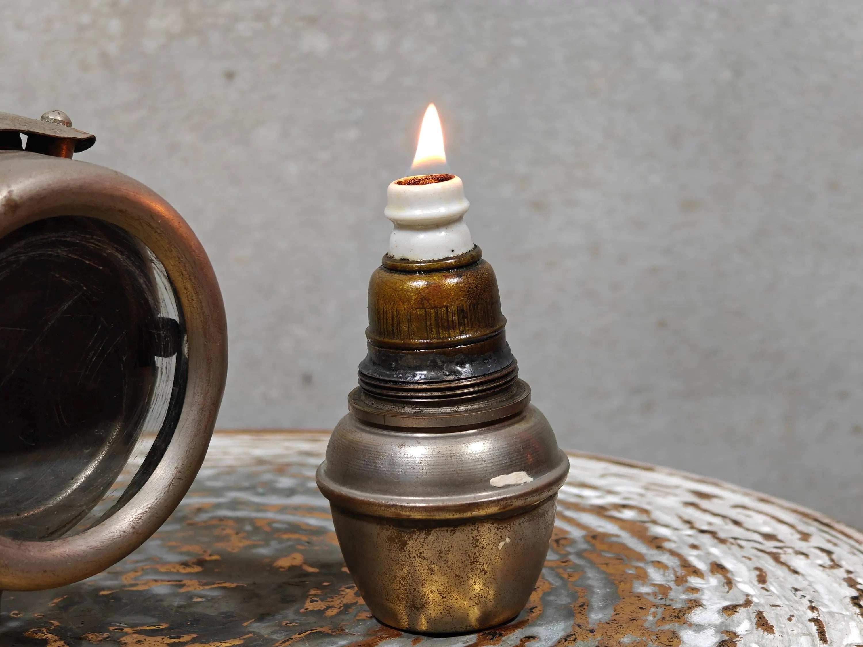 Rare Vintage Automobile Oil Lamp – French Side Lamp (1920s/30s) showing lit antique automotive oil lamp detail