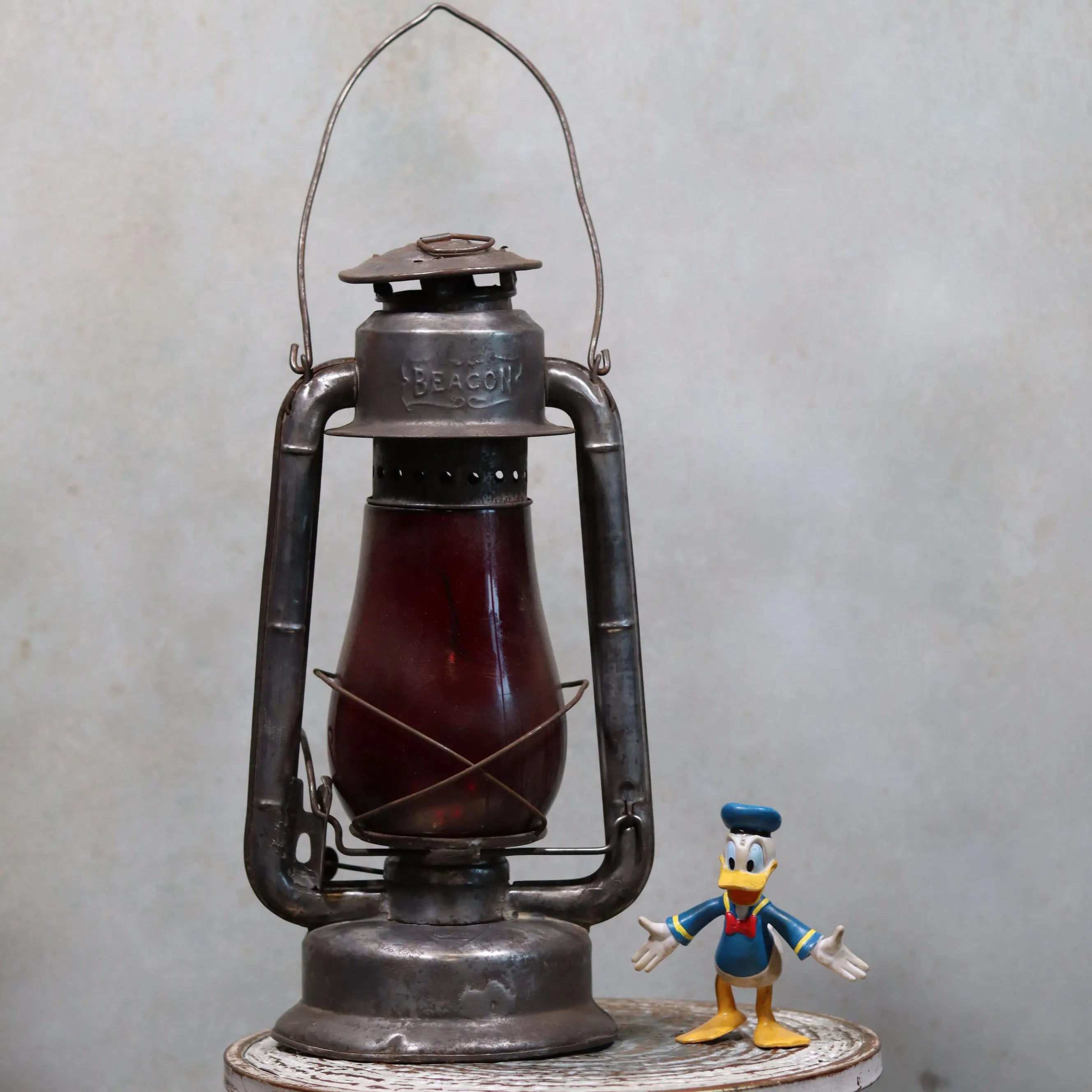 Rare Canadian Beacon Hurricane Lantern – Vintage Red Glass Kerosene Lamp with metal frame and deep red glass globe