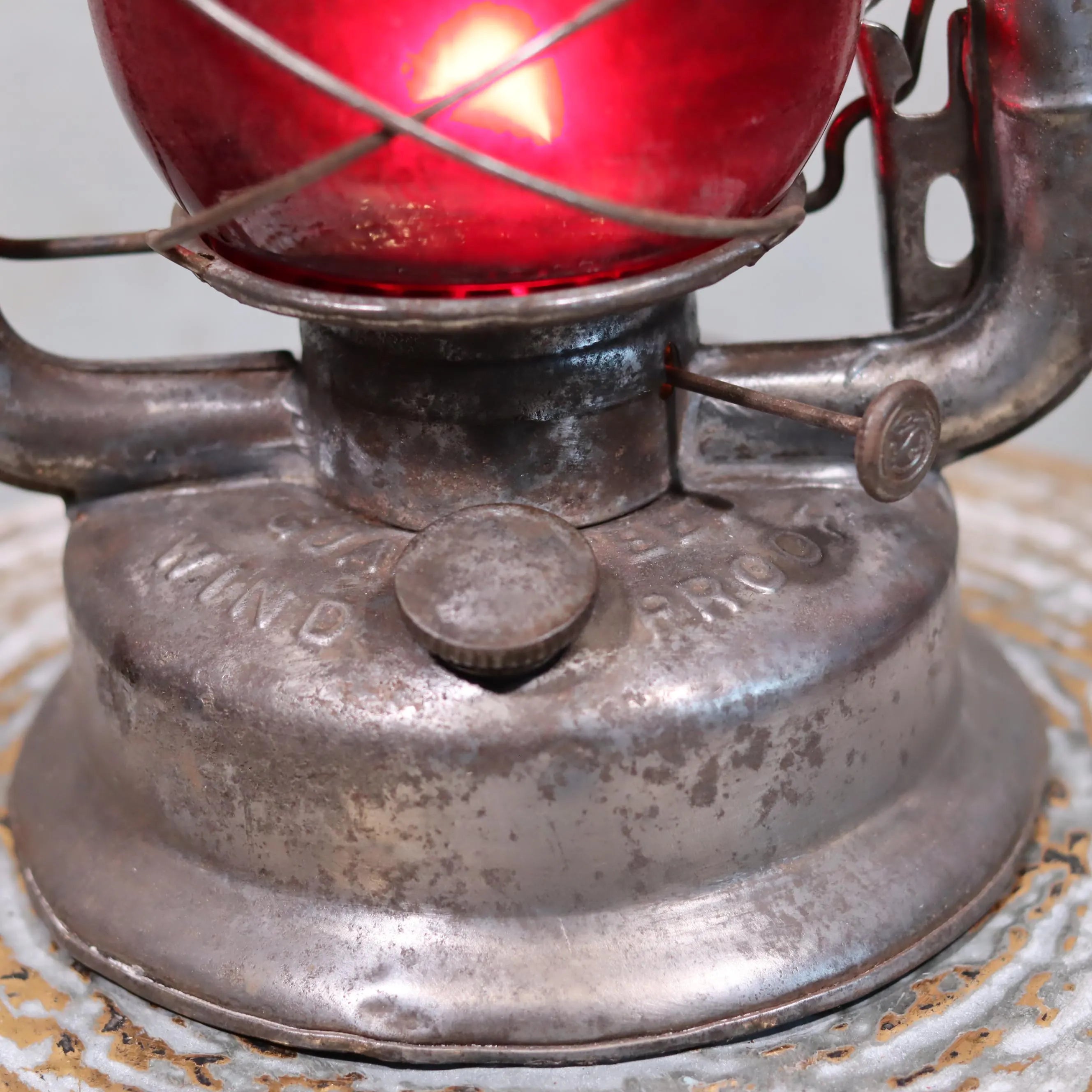 Rare Canadian Beacon Hurricane Lantern – Vintage Red Glass Kerosene Lamp with aged metal base and protective glass globe