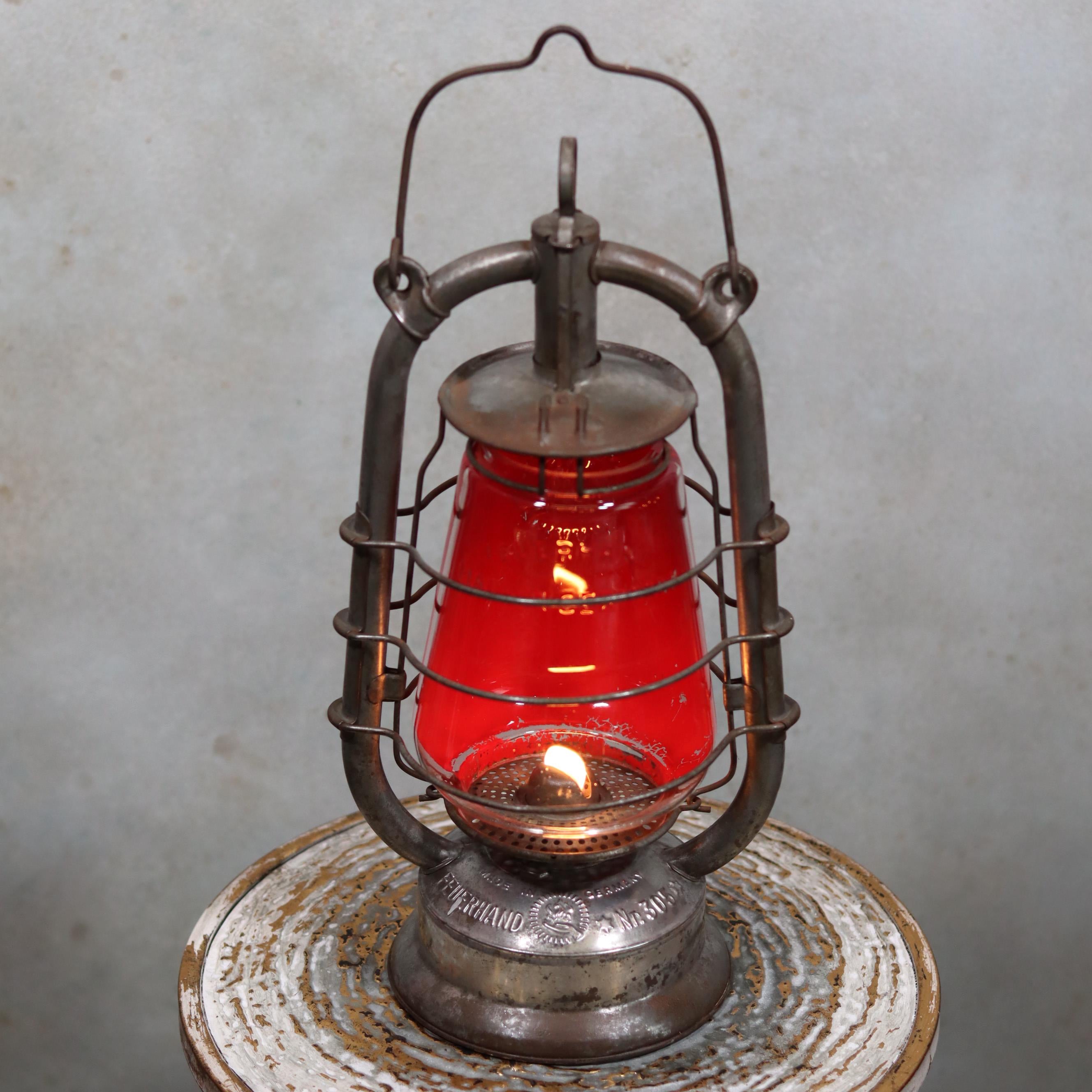 Rare Feuerhand 305 Hurricane Lantern – German Vintage Model (1930–1941) with red glass oil lamp and metal frame design