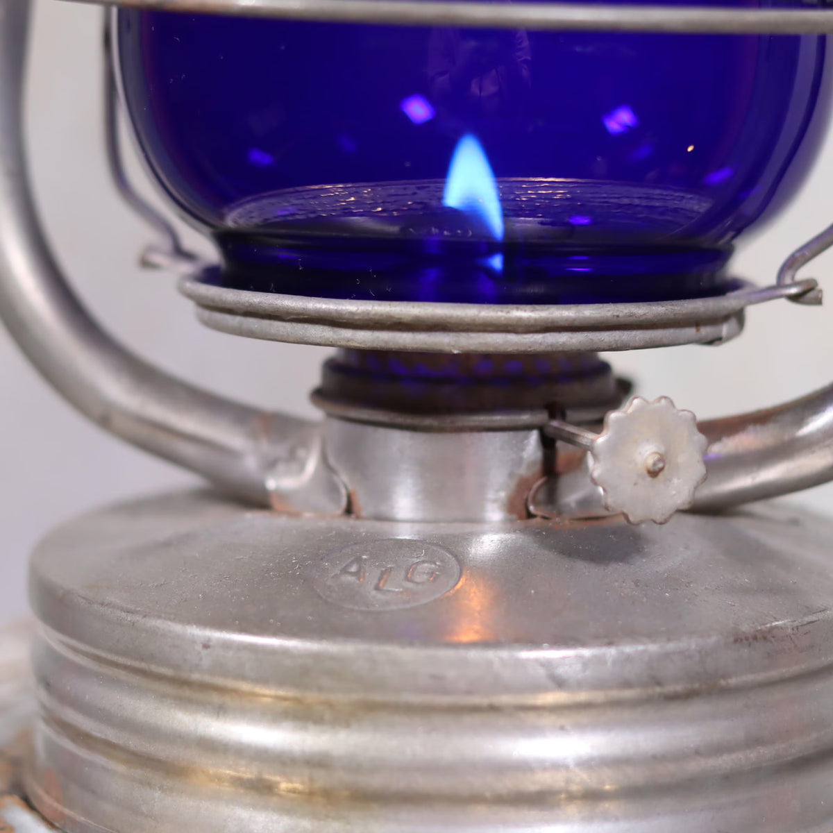 Rare Vintage ALG No. 2 French Storm Lantern – 1960s/70s – Blue Glass with lit oil lamp and distinctive ALG brand engraving